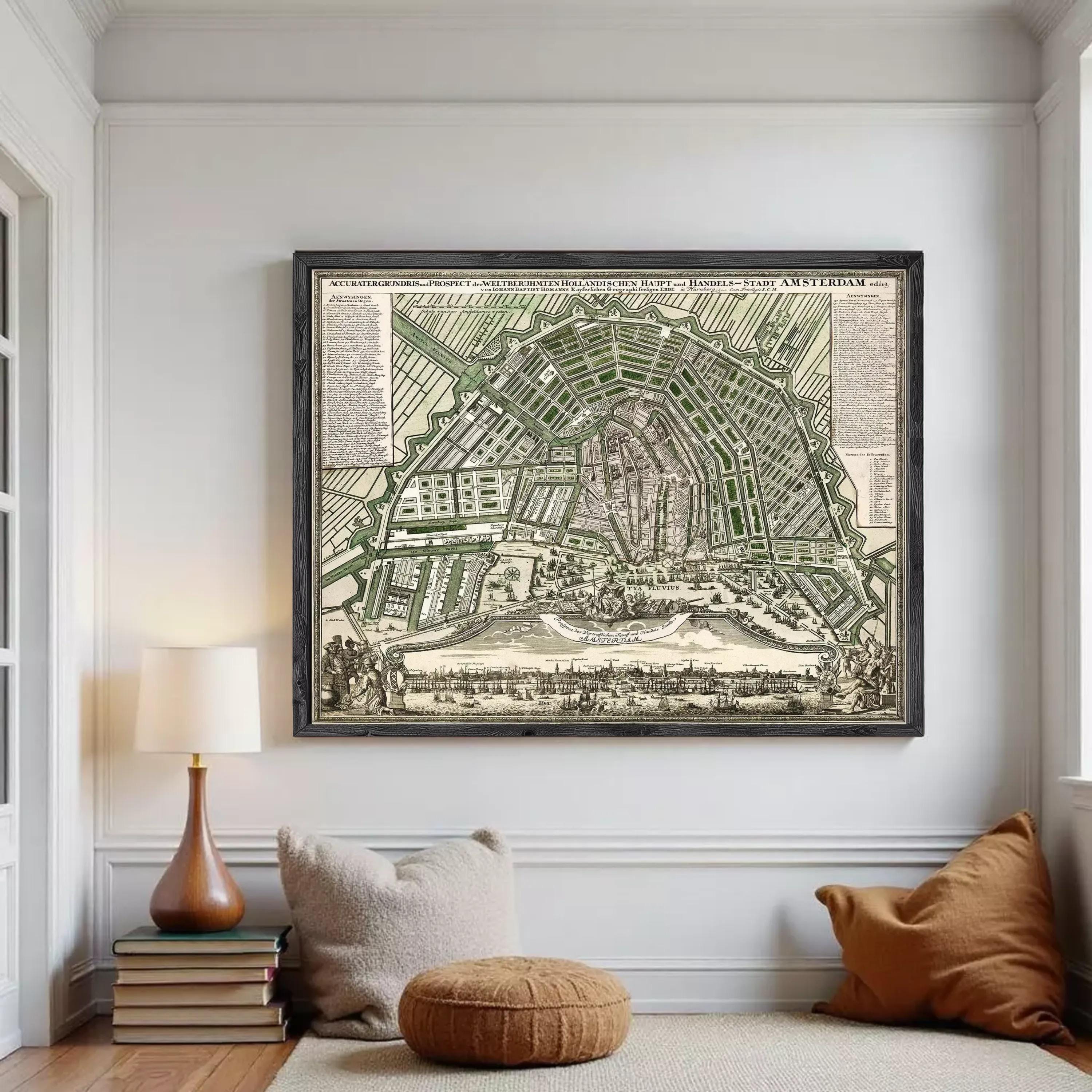 The image is a framed antique map of Amsterdam, Netherlands, depicting the city's layout and surrounding areas.