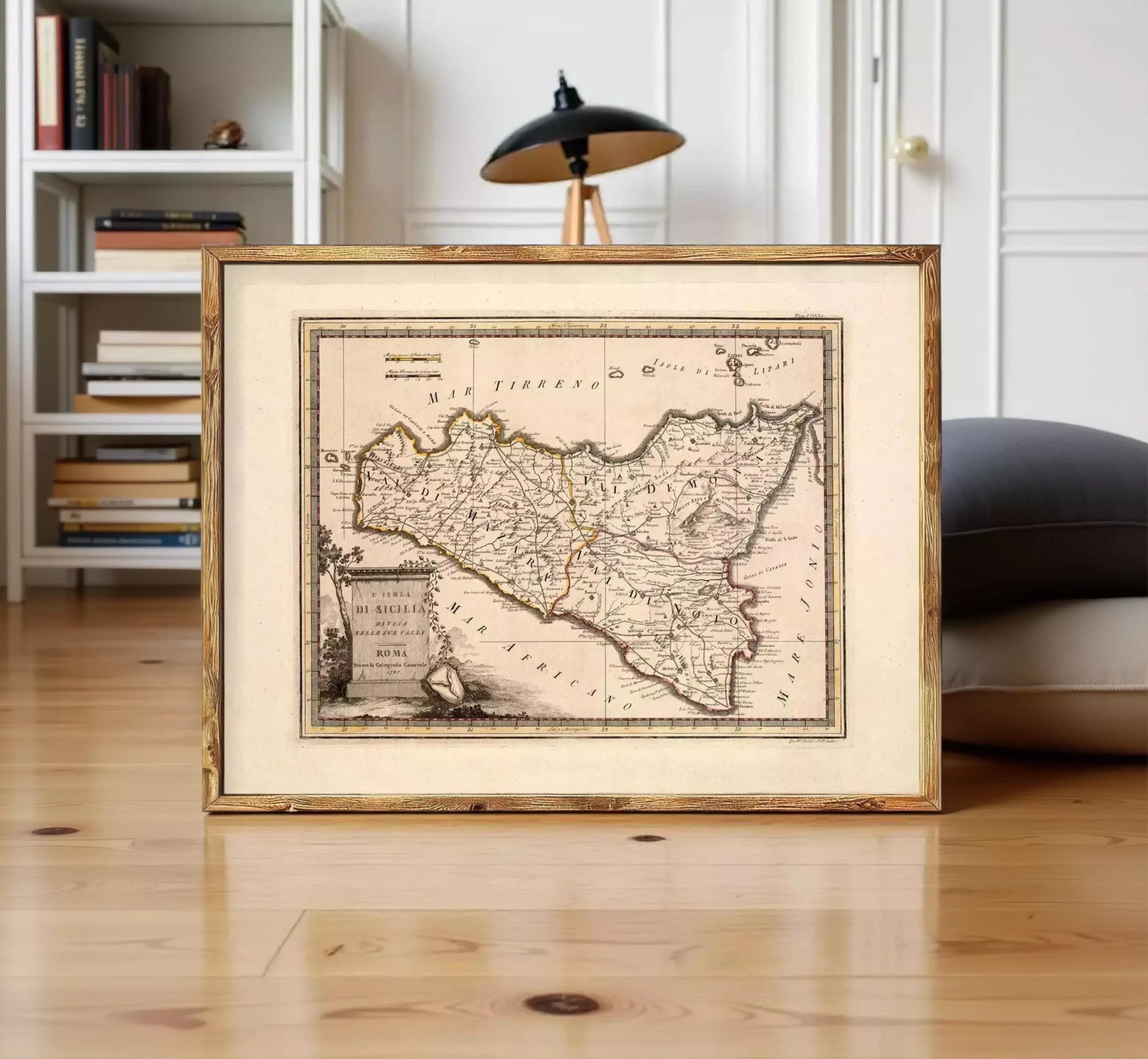 The image is a framed antique map of Italy, depicting the country's geographical layout and boundaries.