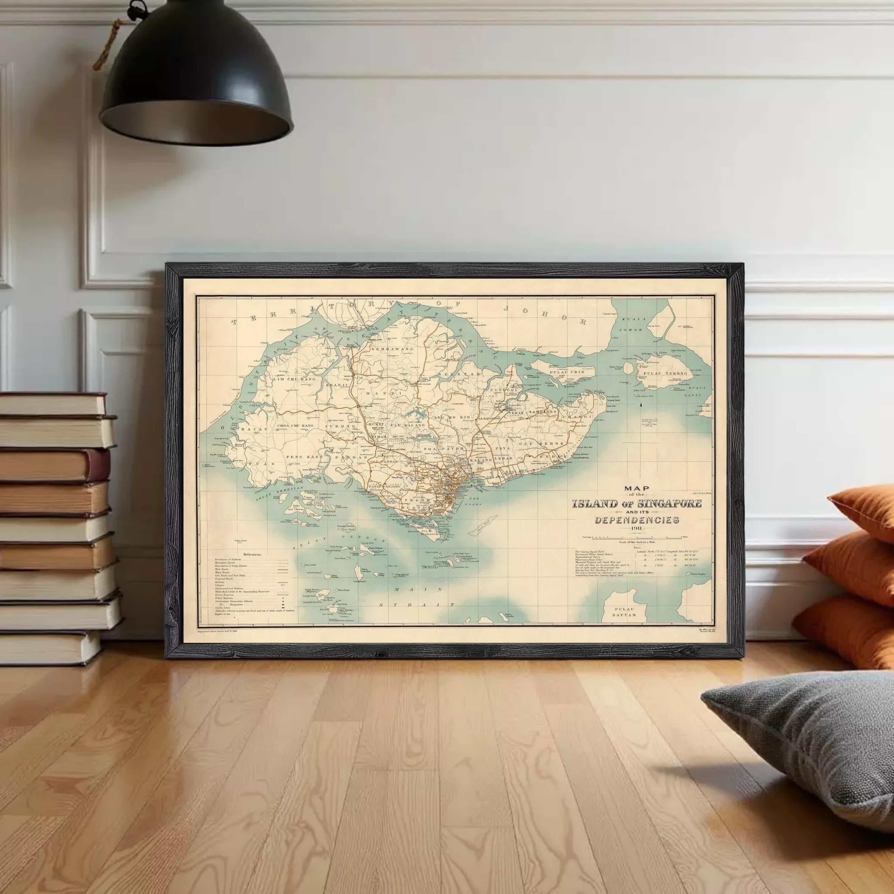The image is a framed vintage map of Singapore, depicting the island's geographical layout and surrounding areas.