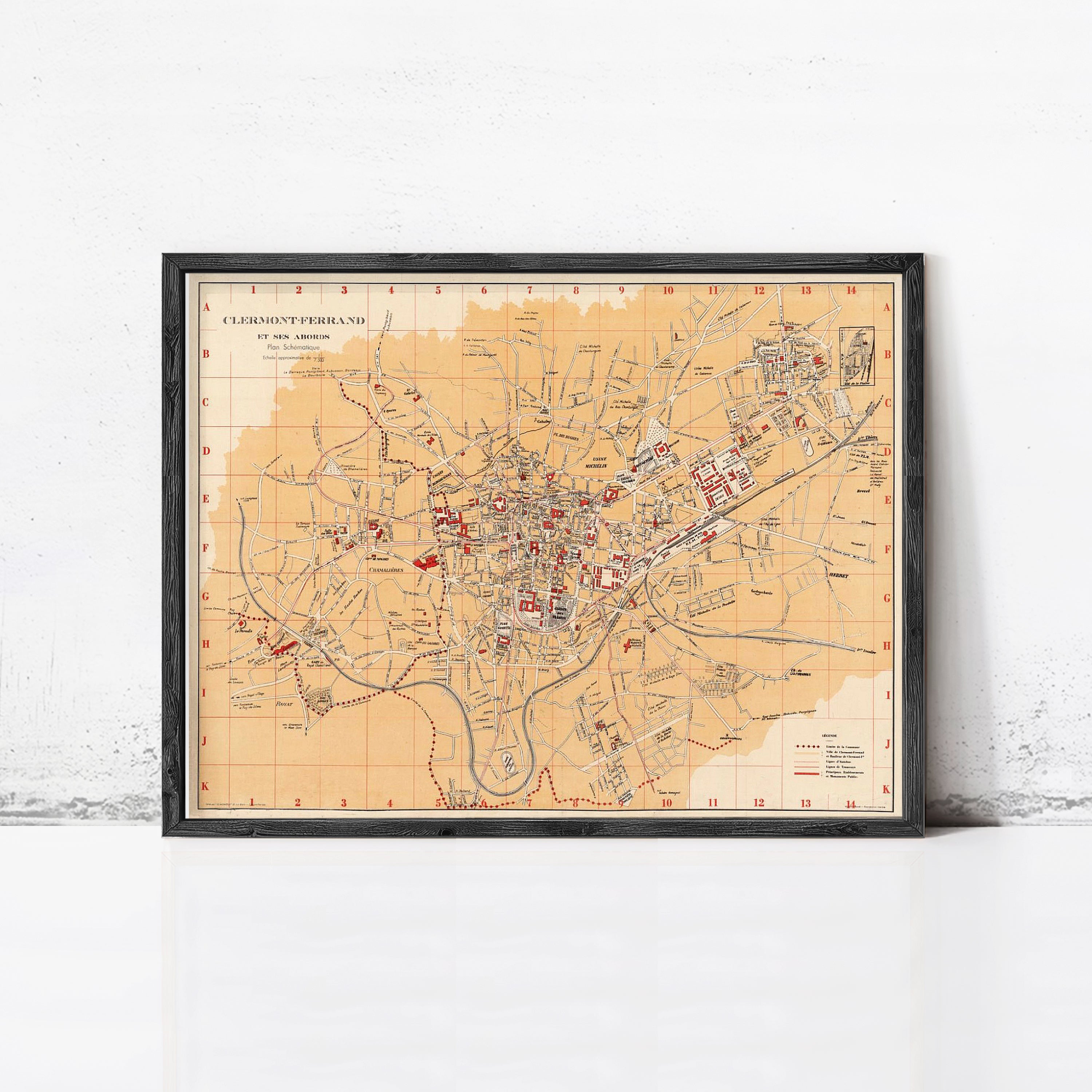 The image is a framed vintage map of a city, likely from the 19th century, with a grid-like layout and various landmarks and streets labeled.