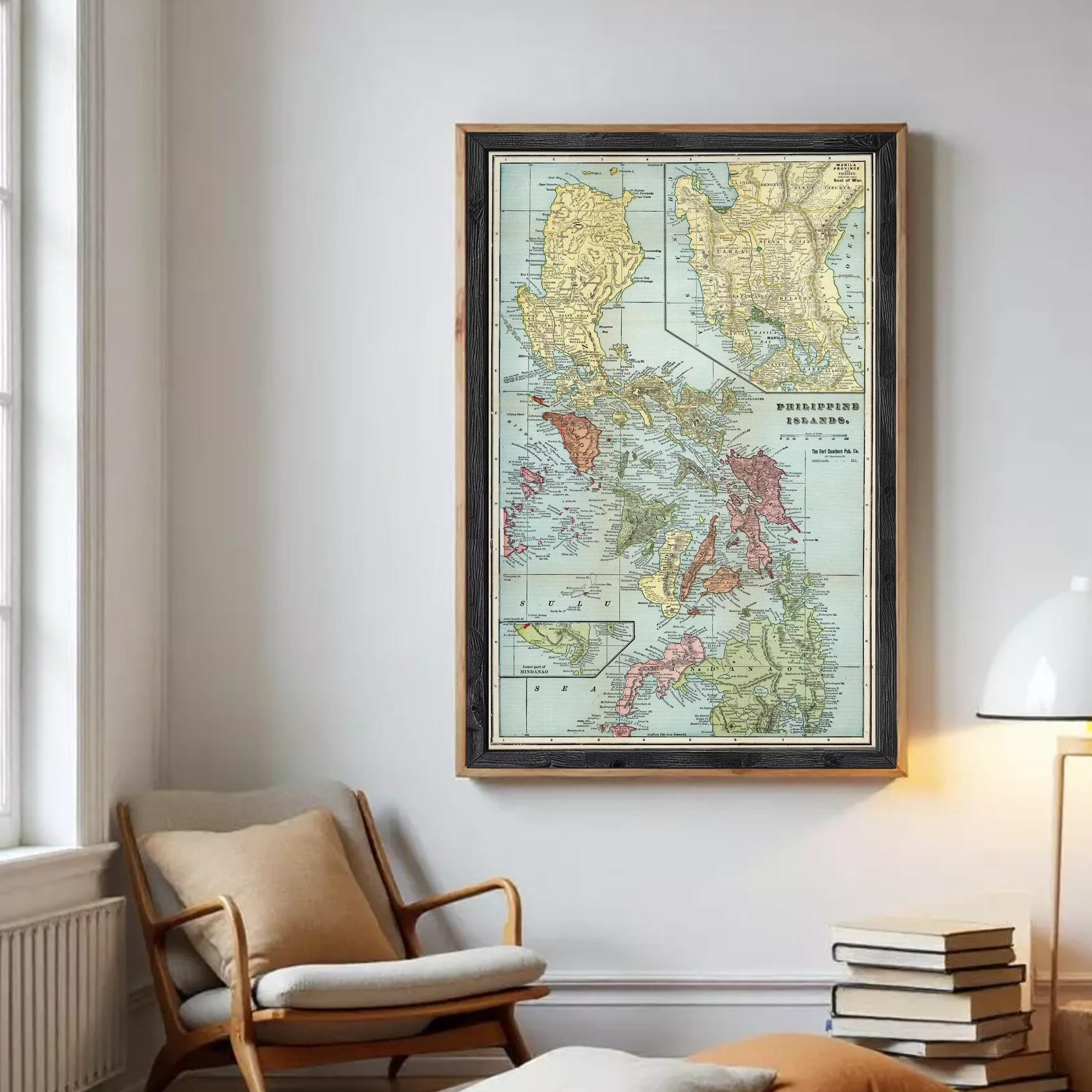The image is a framed vintage map of the Philippines, showing the country's geographical layout and surrounding areas.