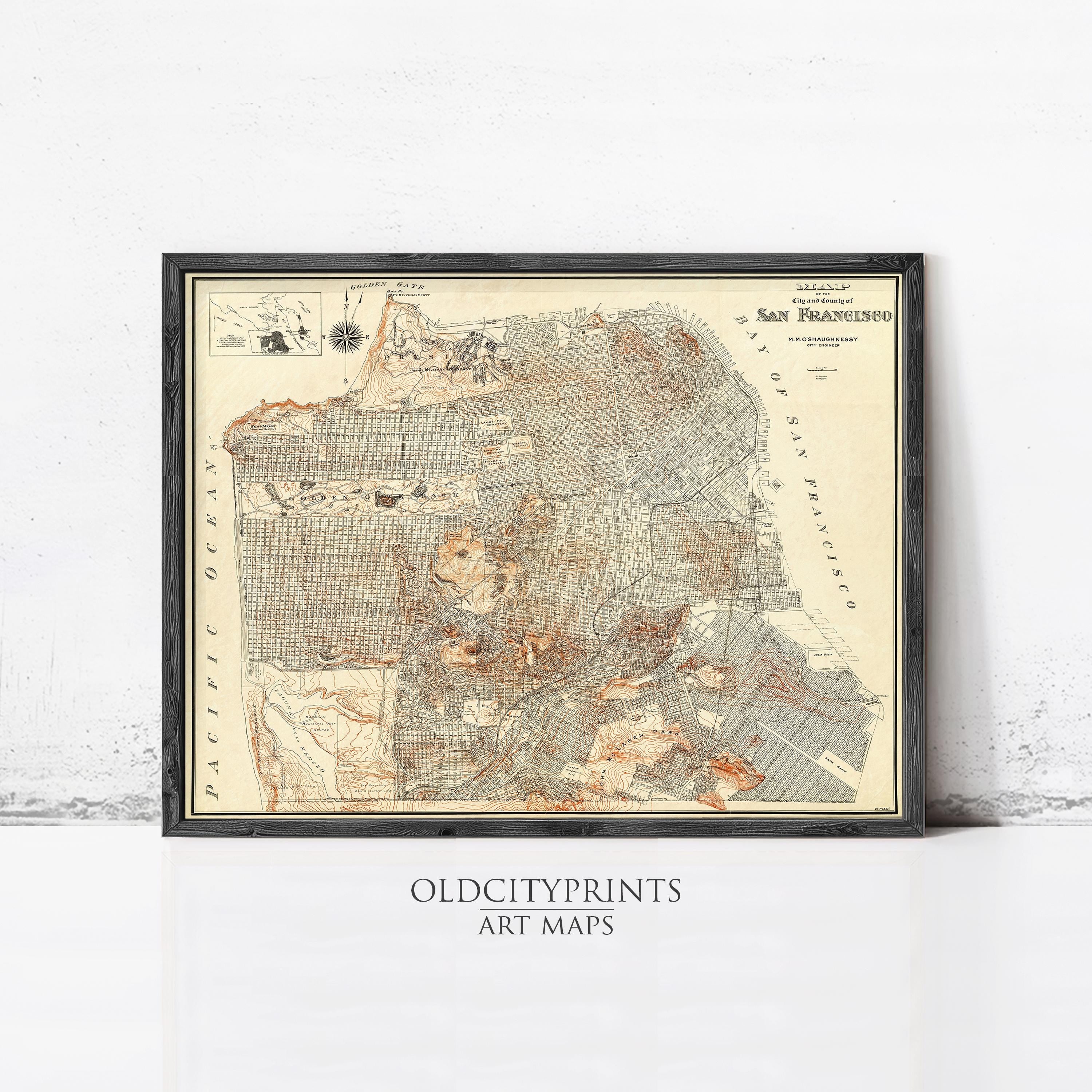 The image is a framed vintage map of San Francisco, California, depicting the city's streets and surrounding areas.
