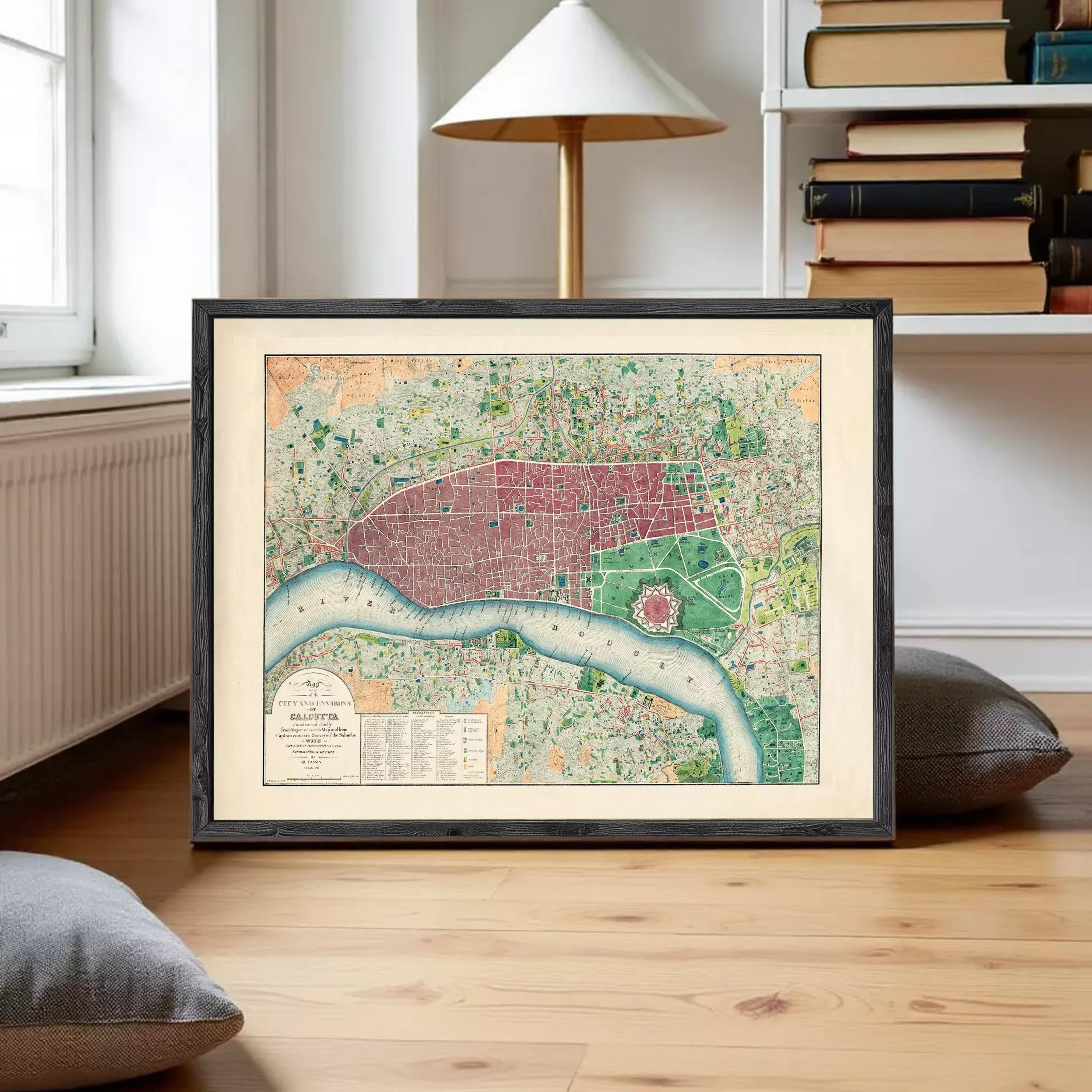The image is a framed vintage map of London, England, depicting the city's streets and landmarks.