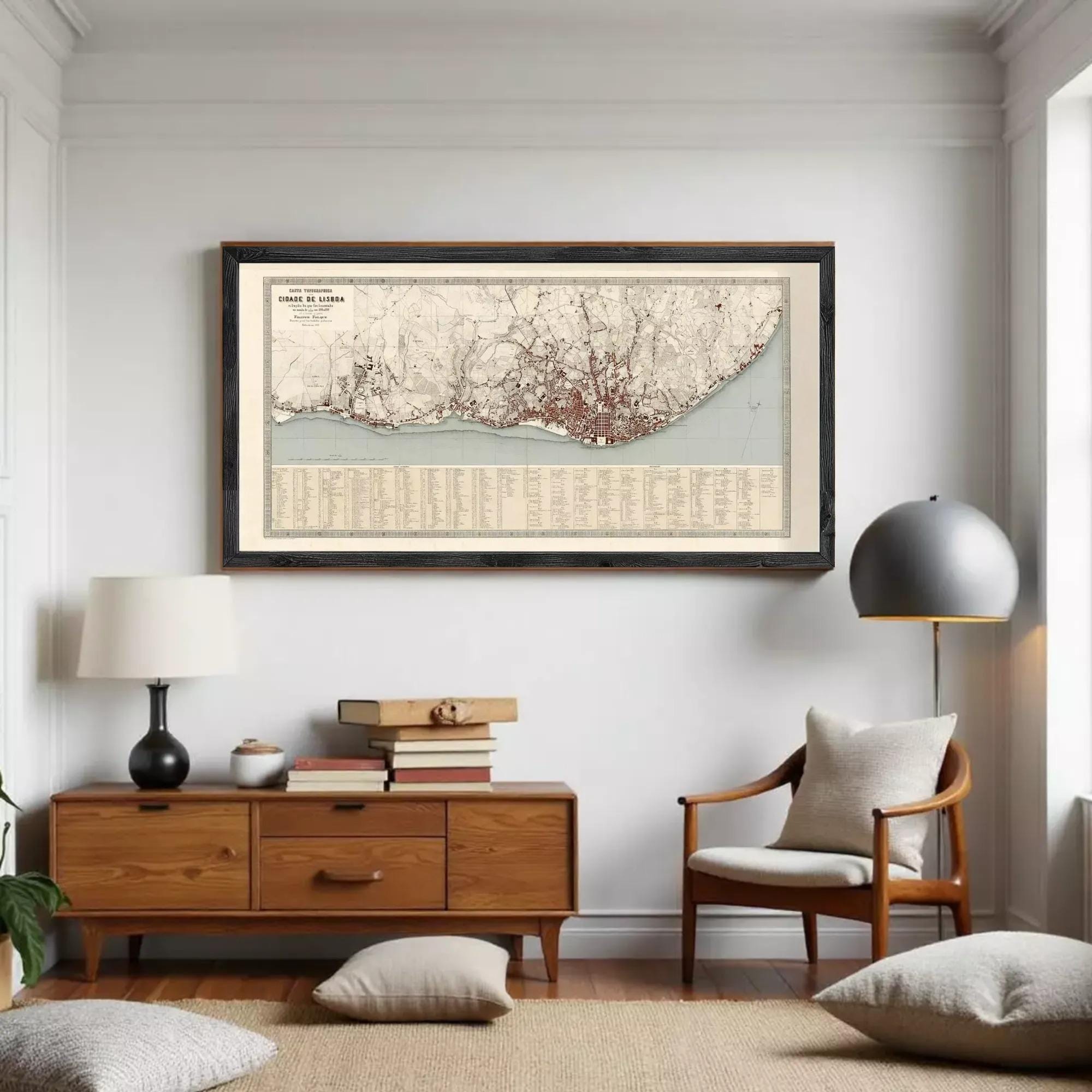 The image is a framed map of a city, likely London, with a detailed layout of the city's streets, landmarks, and surrounding areas.