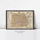 The image is a framed vintage map of a city, likely from the 16th century, with detailed labels and illustrations.