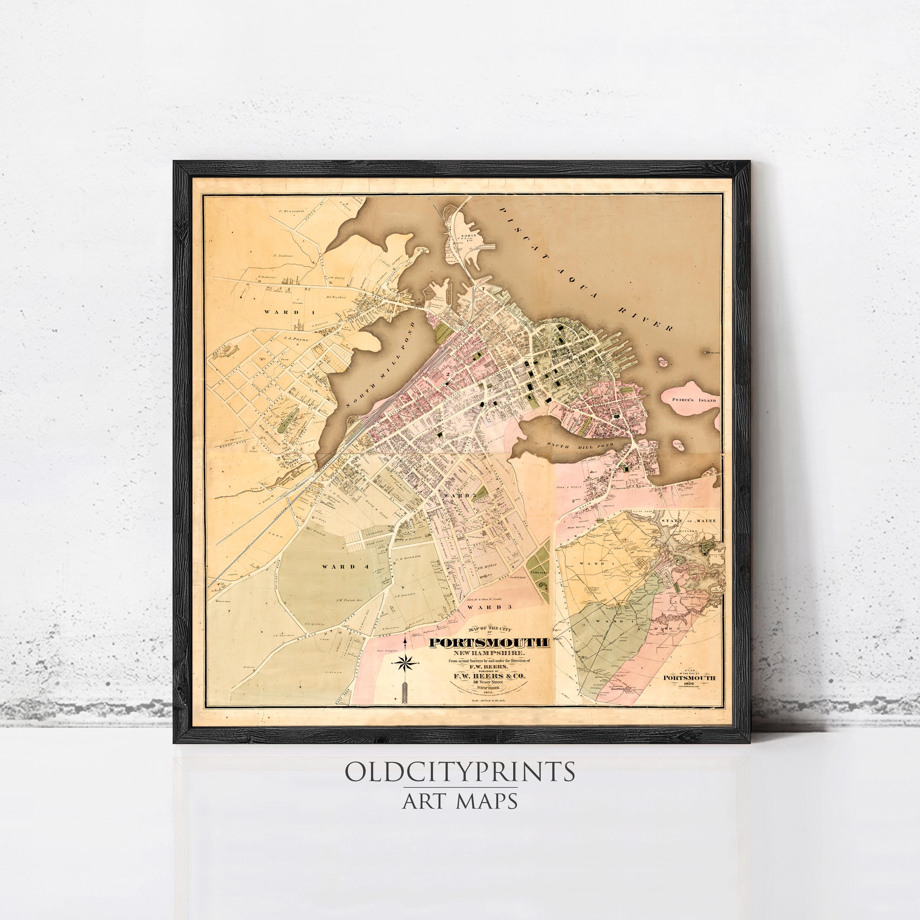 The image is a framed vintage map of the city of Portland, Oregon, with a black border and a beige background.