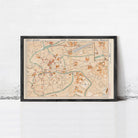 The image is a framed map of Brussels, Belgium, showing the city's streets, landmarks, and surrounding areas.