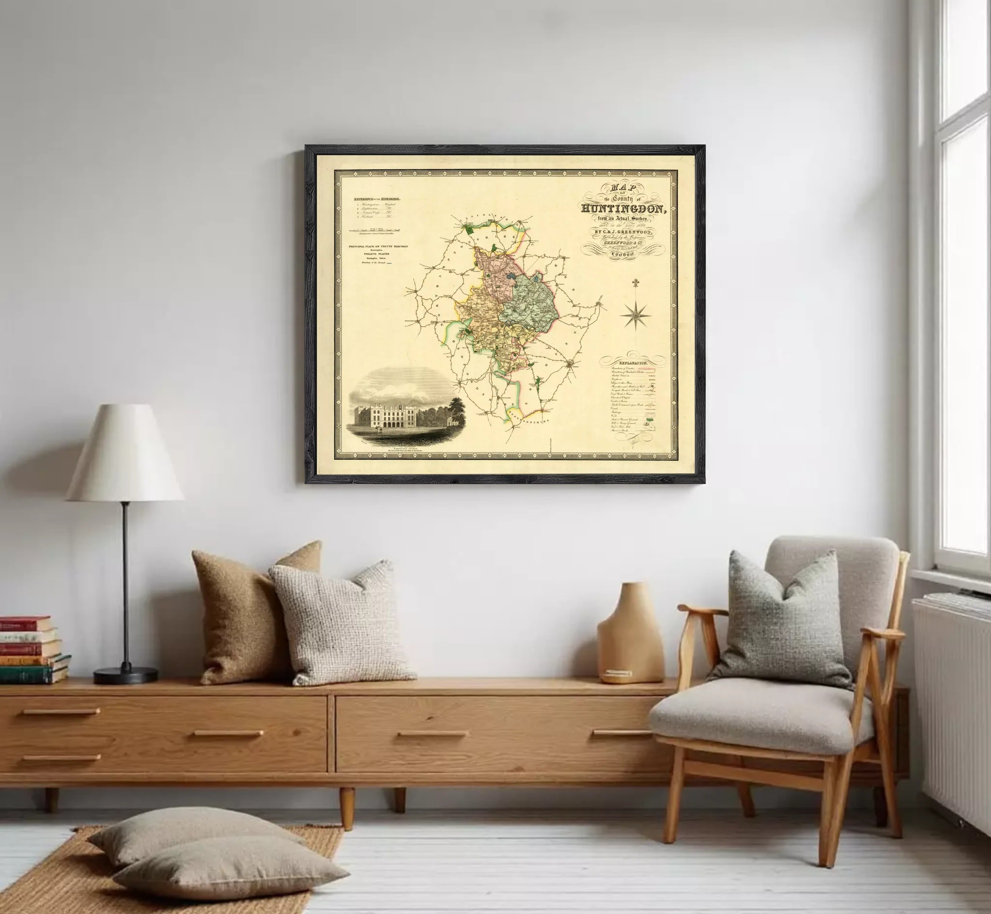 The image is a framed map of Huntingdon, showing a detailed layout of the area with various landmarks and geographical features.