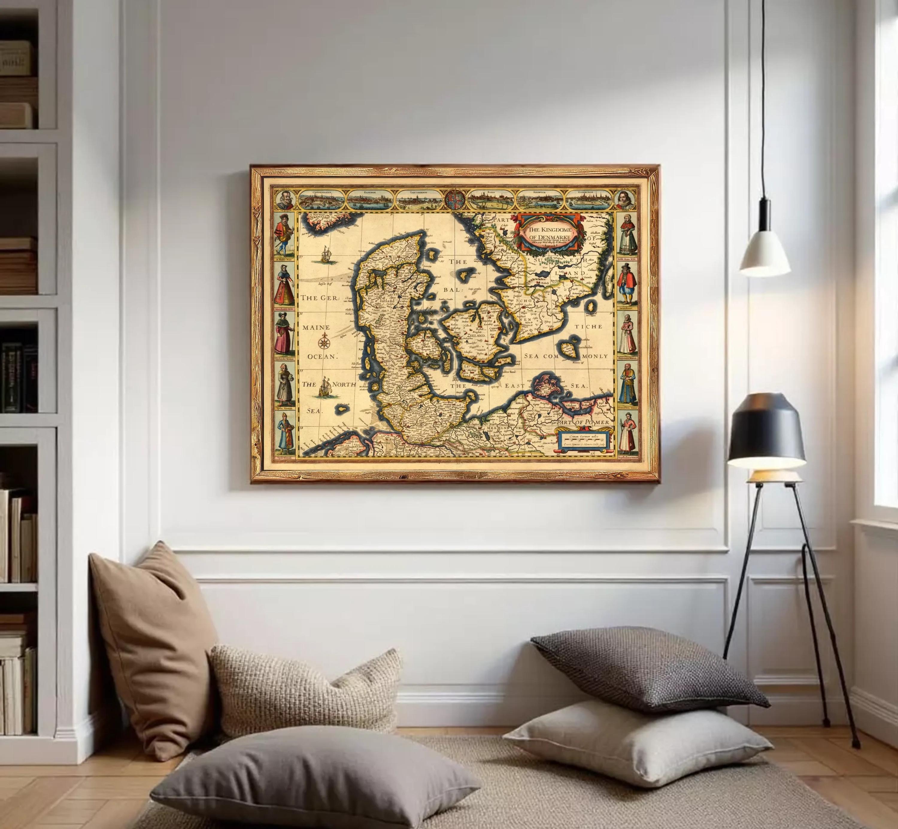 The image is a framed antique map of Europe, featuring detailed illustrations and labels.