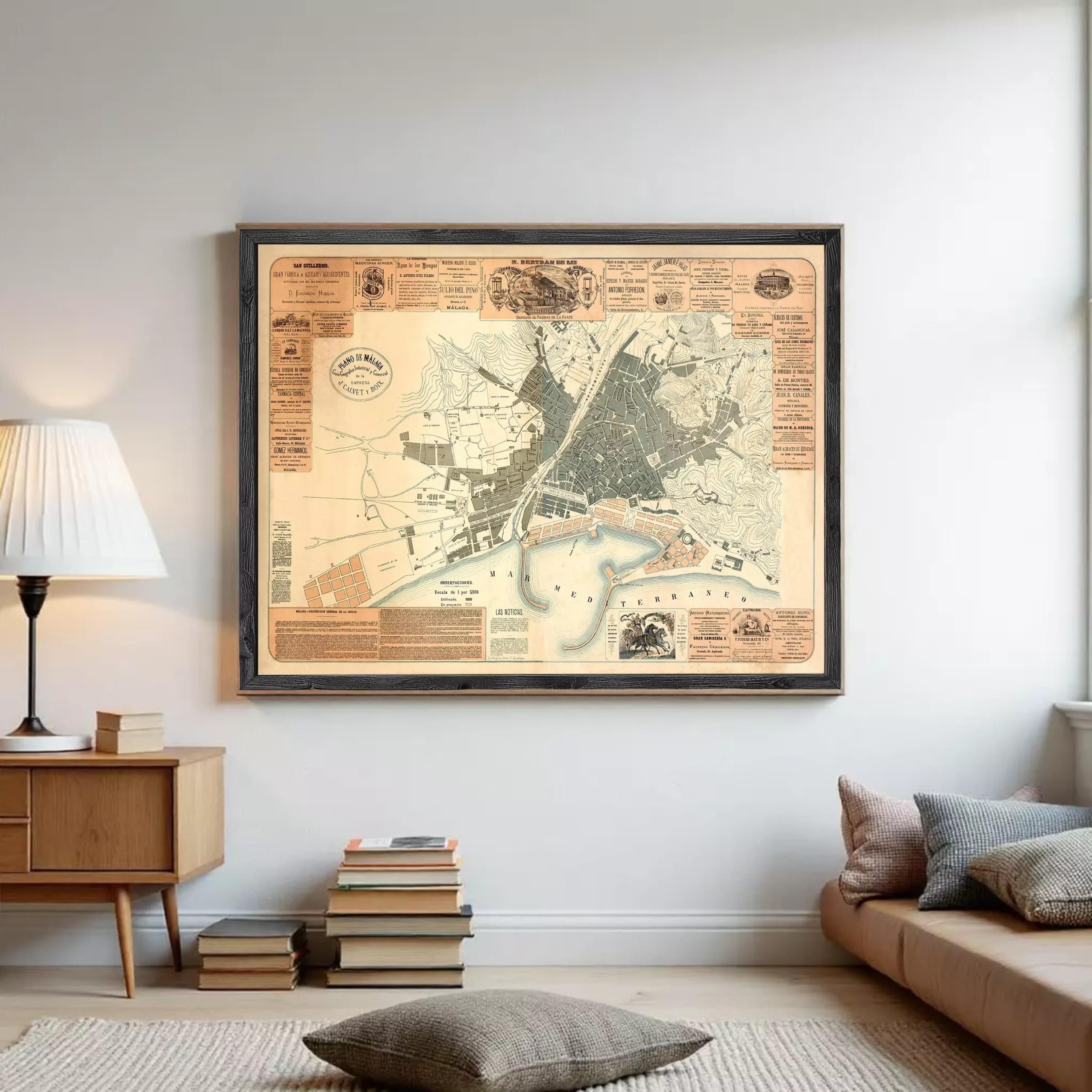 The image is a framed vintage map of a city, likely from the 19th century, with detailed street and geographical information.