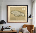 The image is a framed vintage map of Jamaica, depicting the country's geographical layout and boundaries.