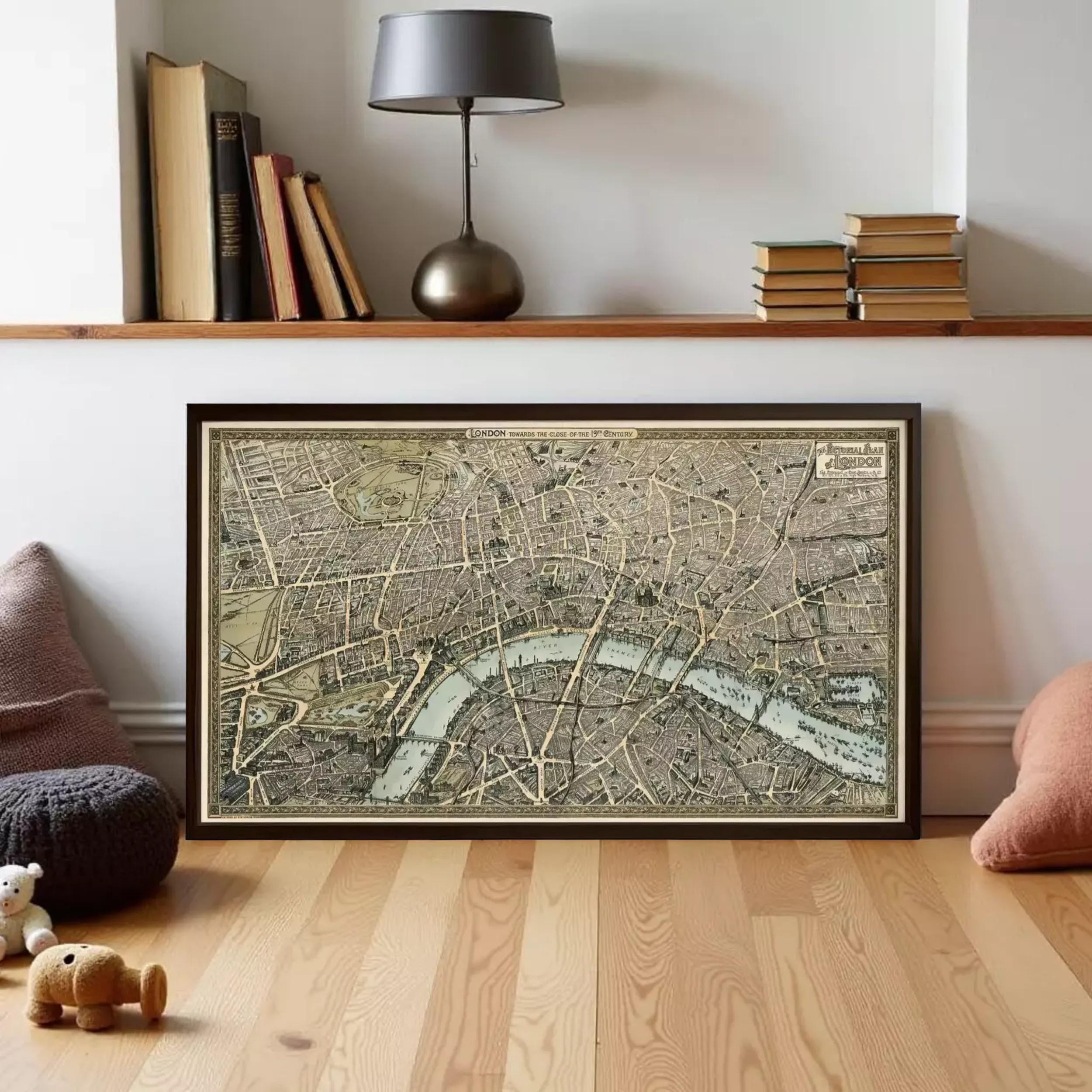 a large framed map of London, with a lamp and bookshelf in the background.