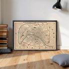 The image is a framed vintage map of Paris, France, depicting the city's streets and landmarks.