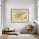 The image is a framed historical map of a city, likely from the 18th century, depicting a detailed layout of the streets, buildings, and surrounding areas.
