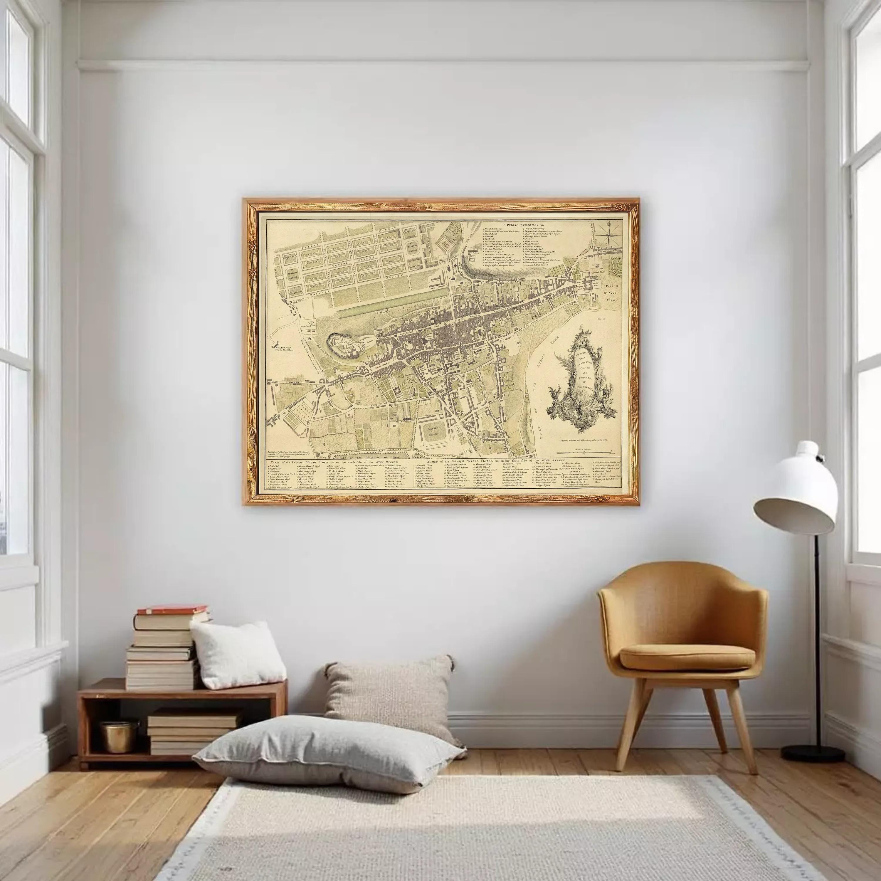 The image is a framed historical map of a city, likely from the 18th century, depicting a detailed layout of the streets, buildings, and surrounding areas.