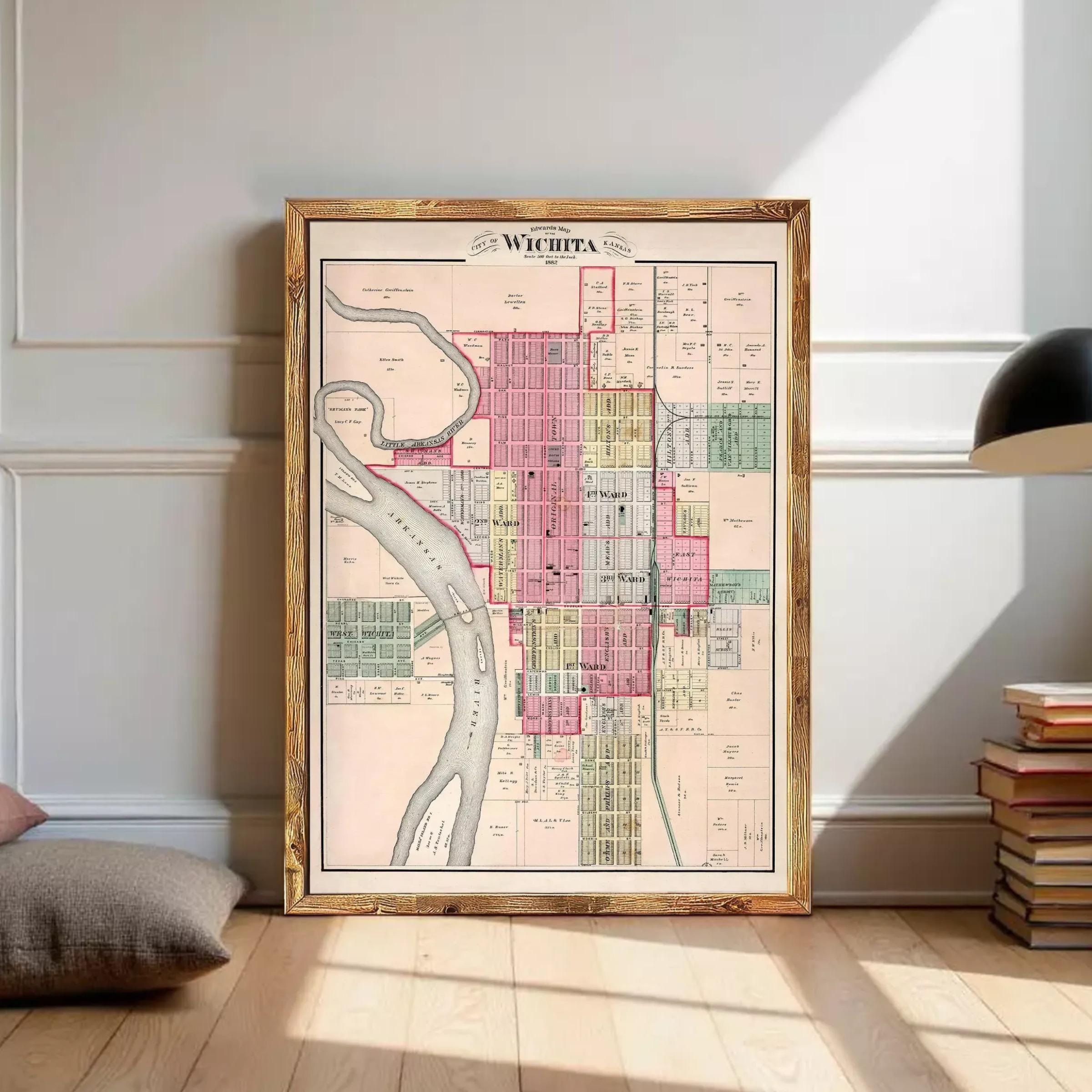 The image is a framed map of the city of Wichita, Kansas, depicting the layout of the city with streets, buildings, and other landmarks.