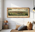 A framed map of a city, depicting a detailed view of the landscape and surrounding areas.