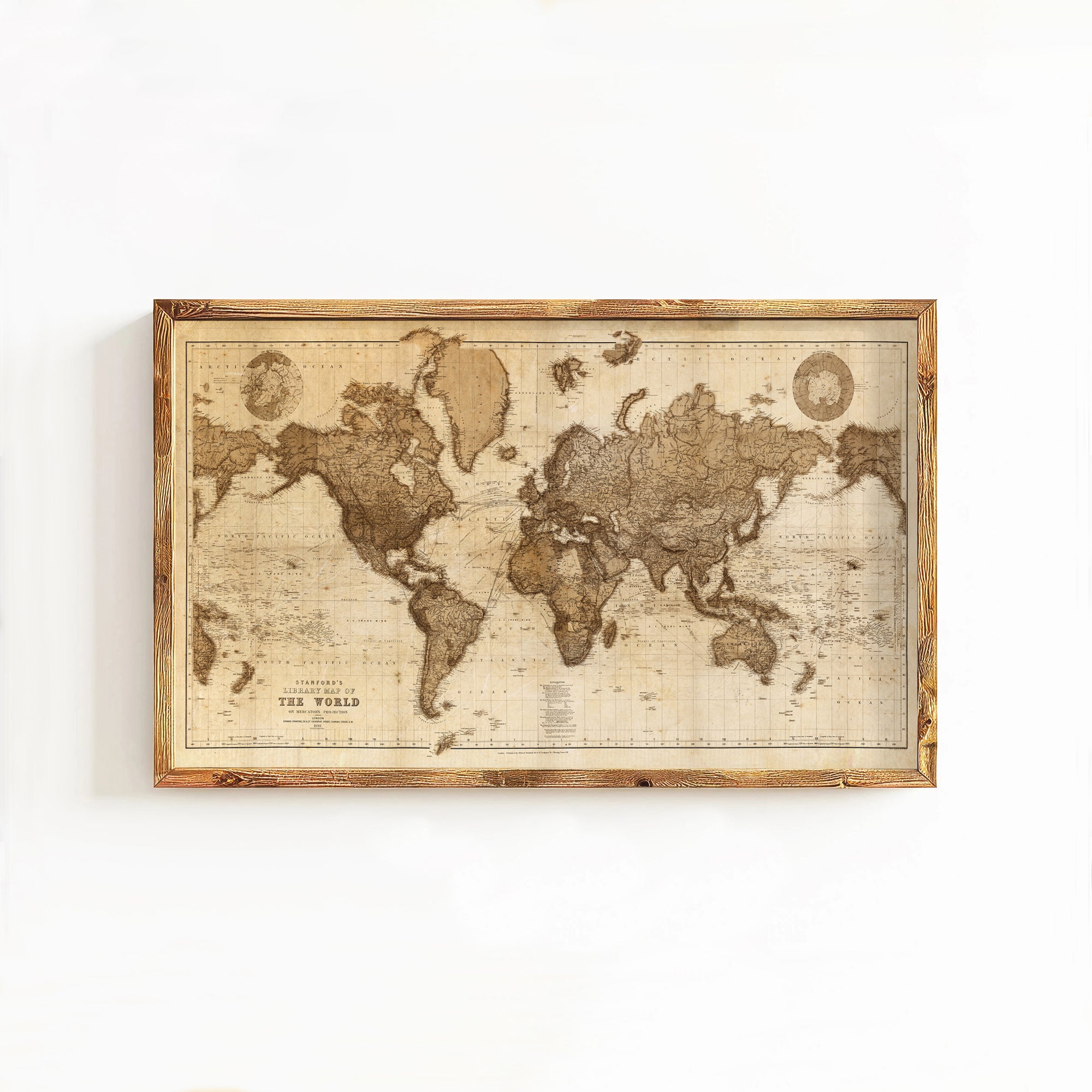 The image is a framed vintage world map with a wooden frame.
