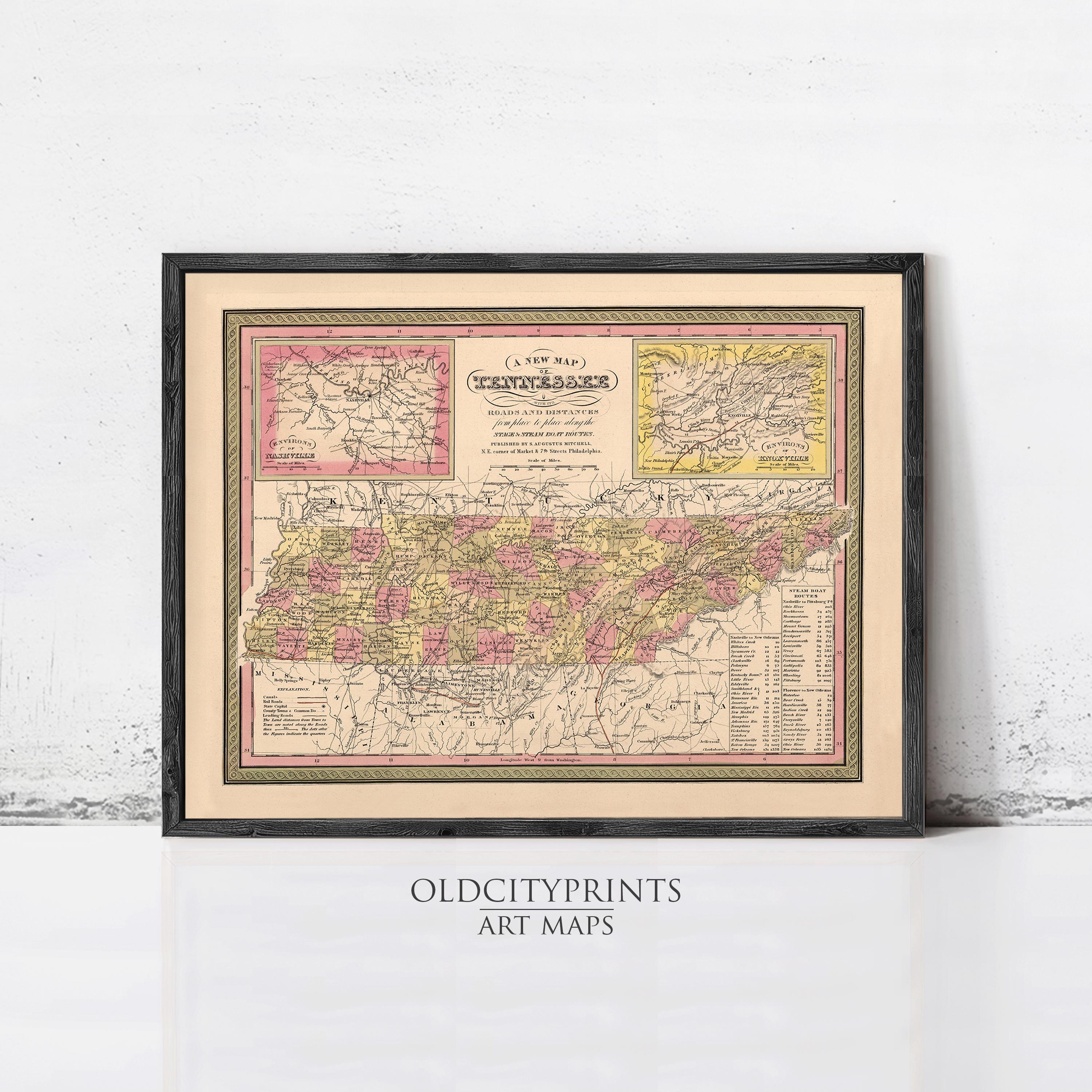 A framed vintage map of Tennessee, with a detailed illustration of the state's geographical features and boundaries.