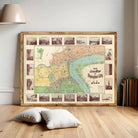 a large framed map of Shanghai, China, with various landmarks and streets depicted in different colors and sizes. The map is displayed on a wooden floor, with a lamp and some books visible in the background.
