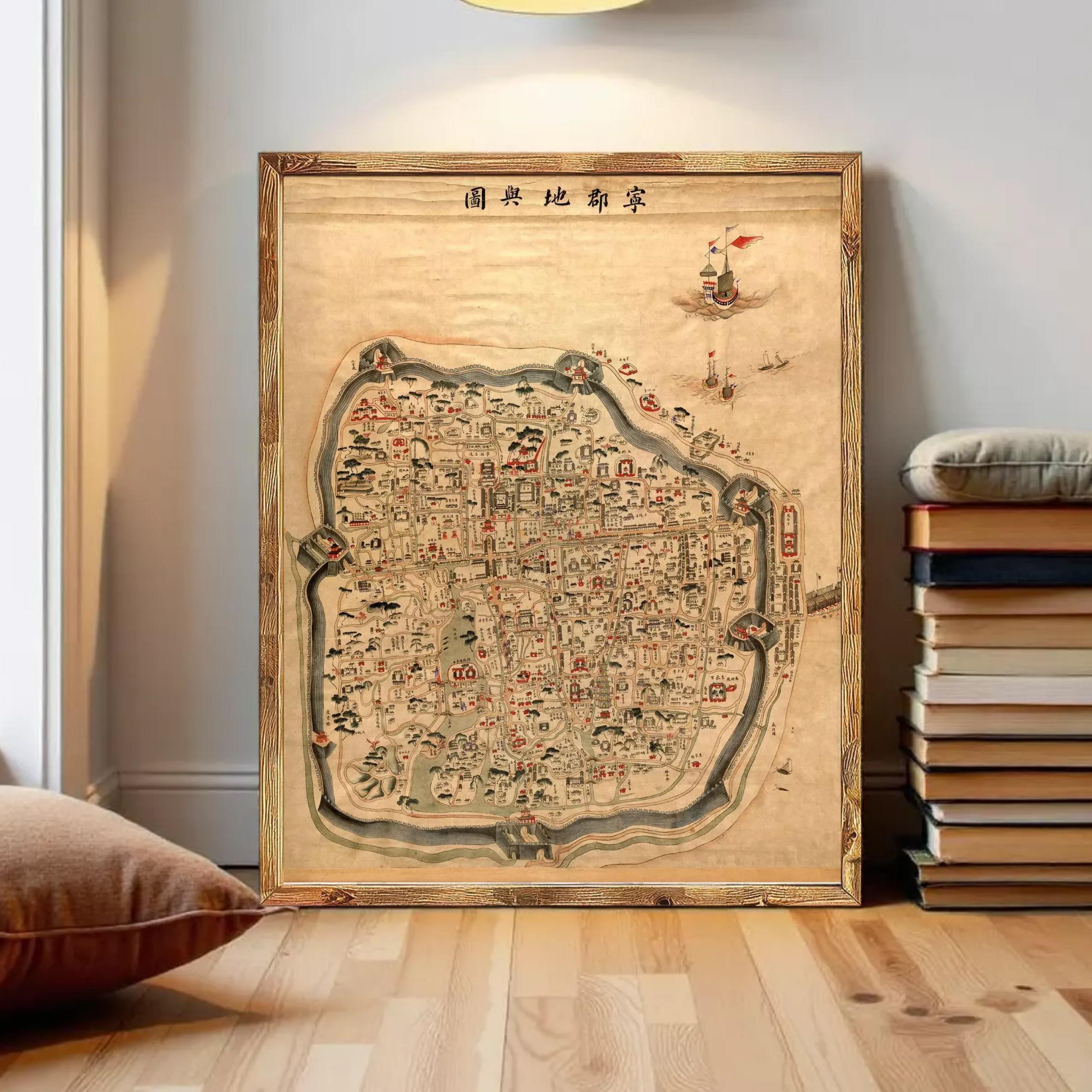 The image is a framed map of a city, likely from an ancient or historical period, with various landmarks and streets depicted.