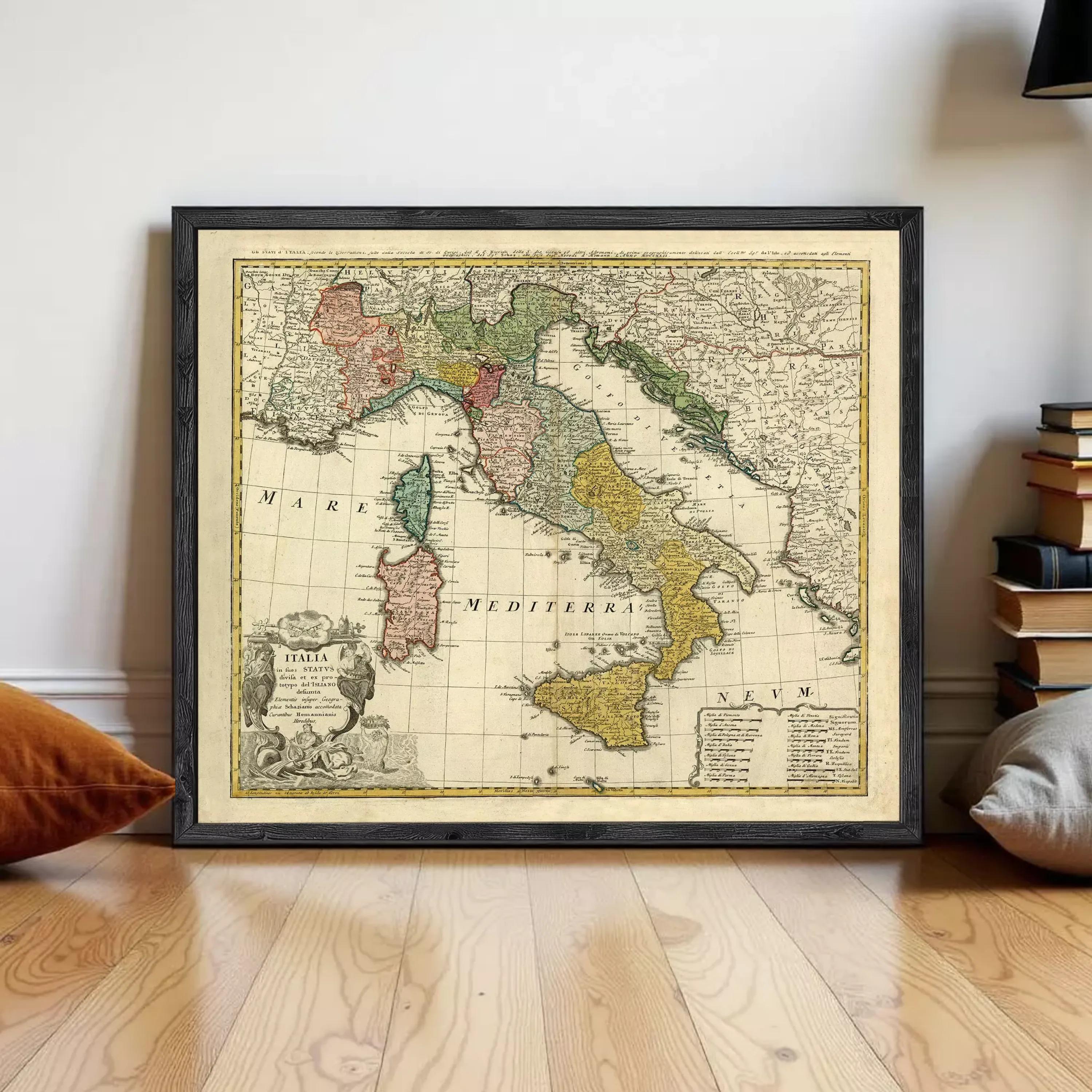 The image is a framed vintage map of Italy, showing the country's geographical layout and surrounding regions.