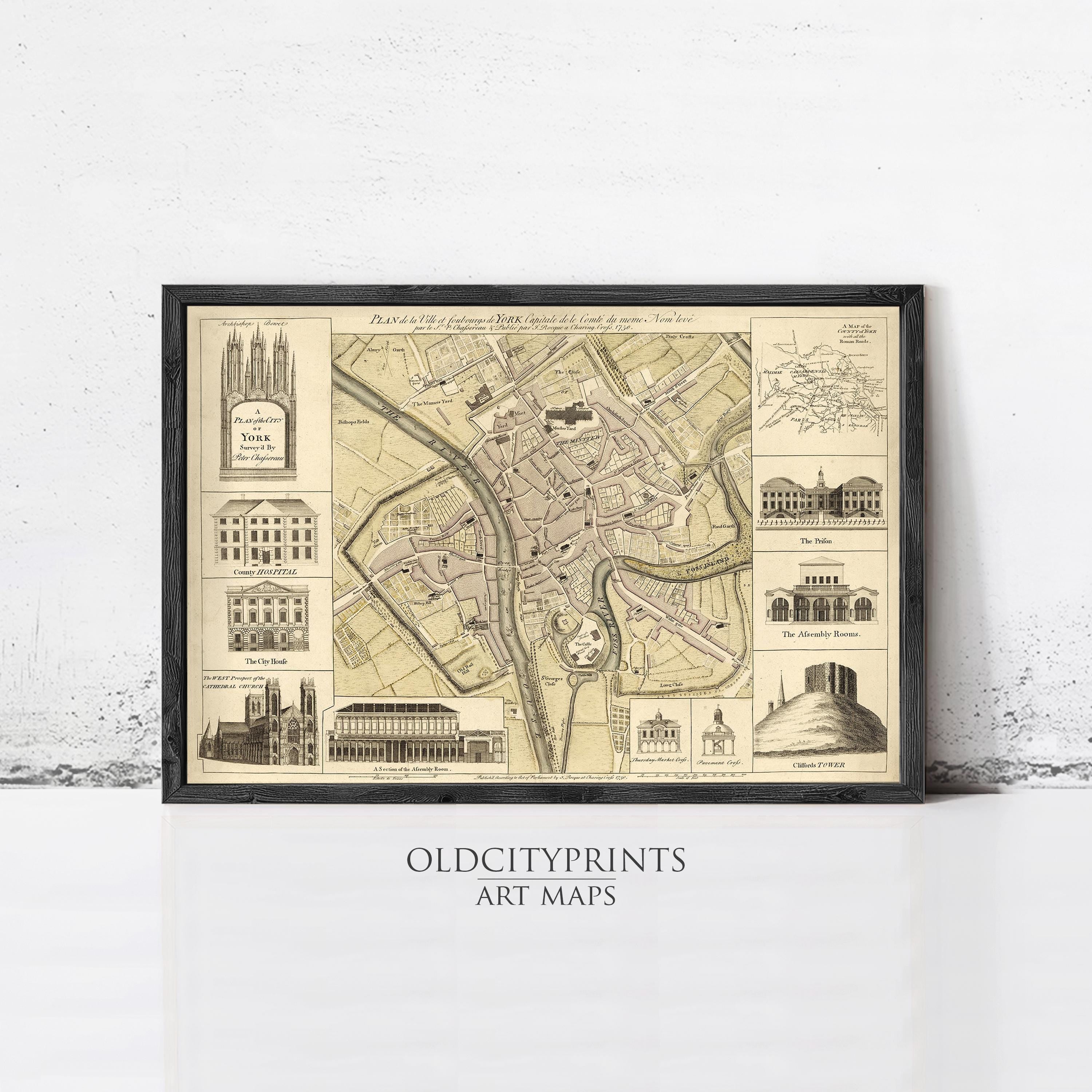 The image is a framed art print depicting a detailed map of a city, with various landmarks and buildings labeled.