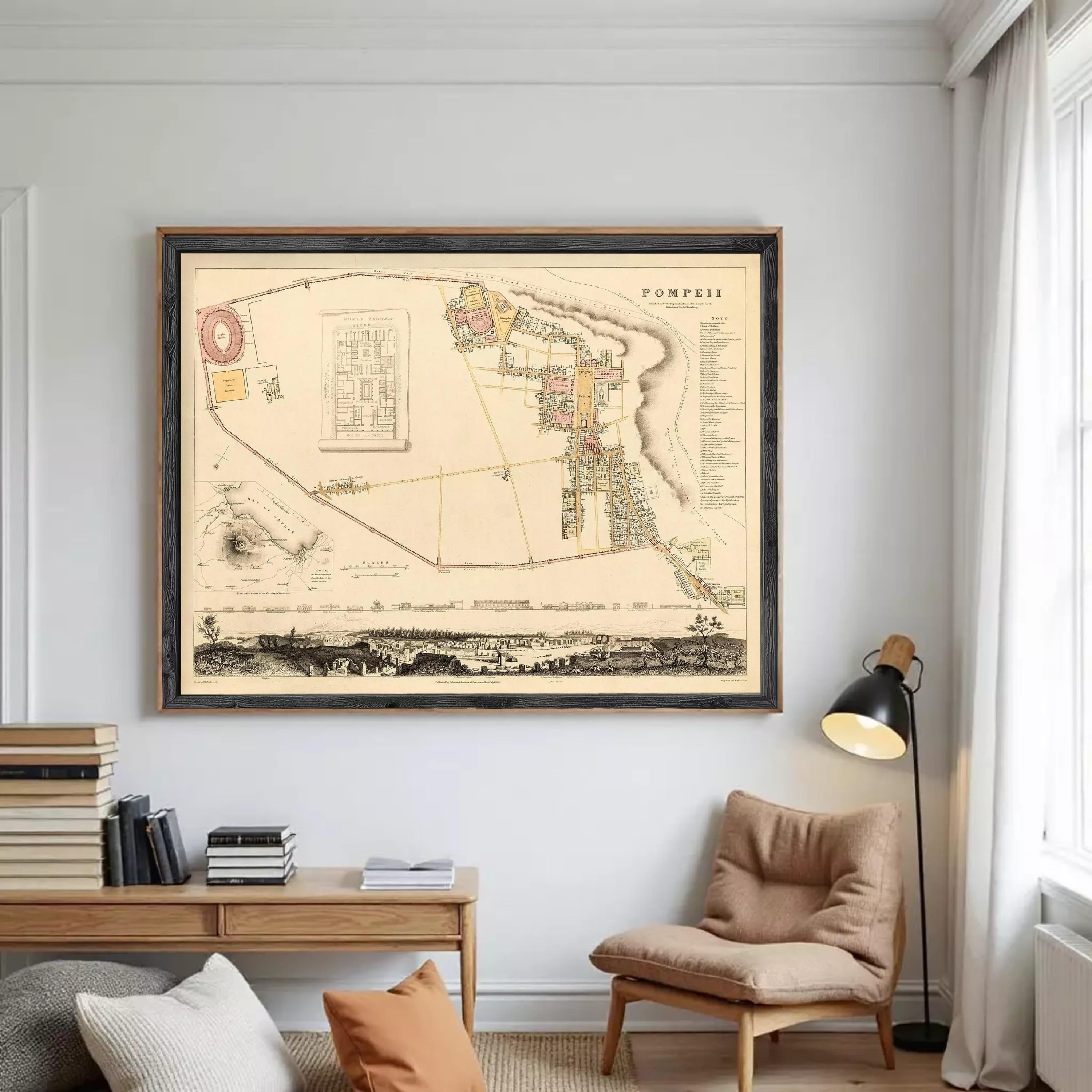The image is a framed historical map of the city of Pompeii, depicting the city's layout and surrounding areas.