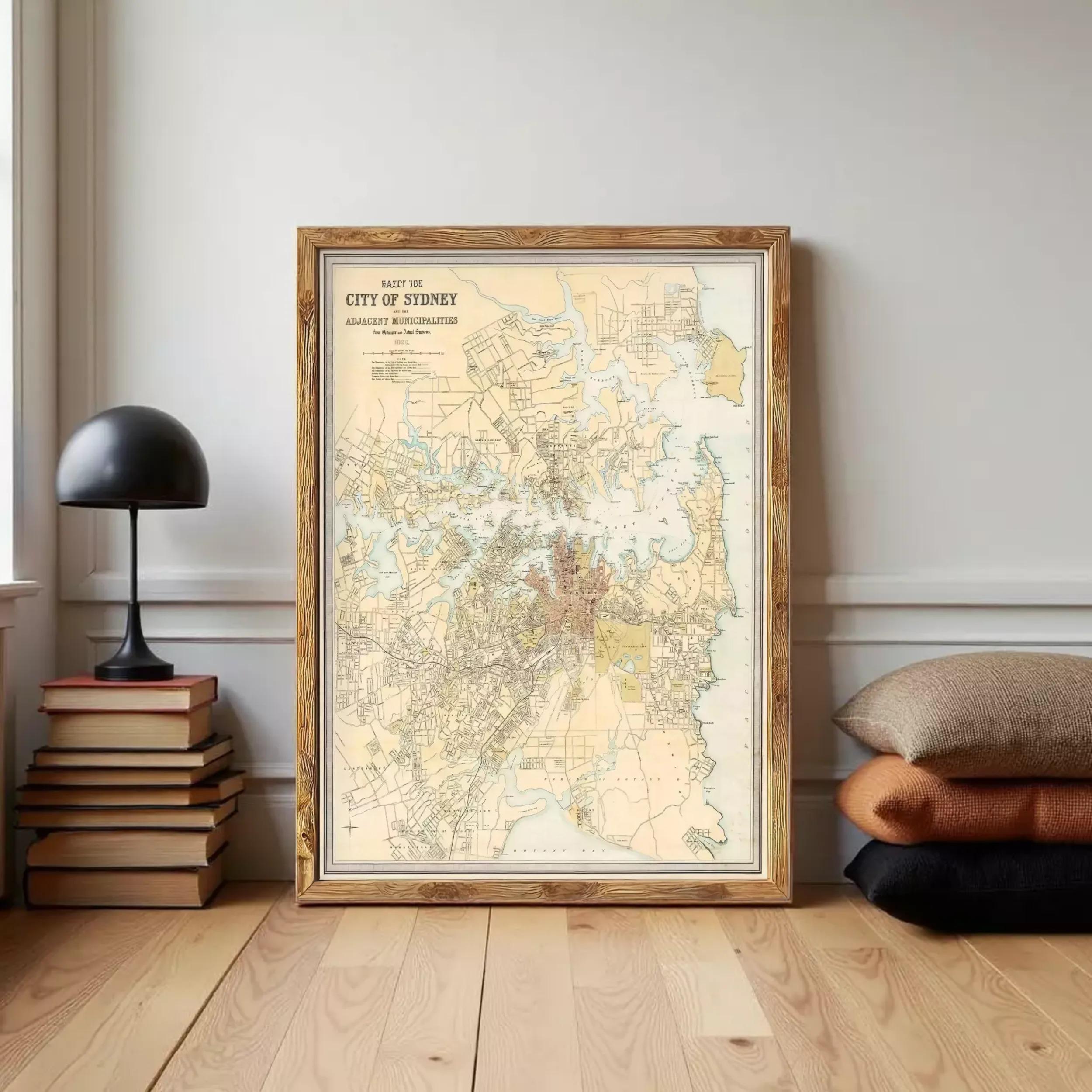 The image is a framed vintage map of the city of Sydney, Australia, depicting the city's layout and surrounding areas.