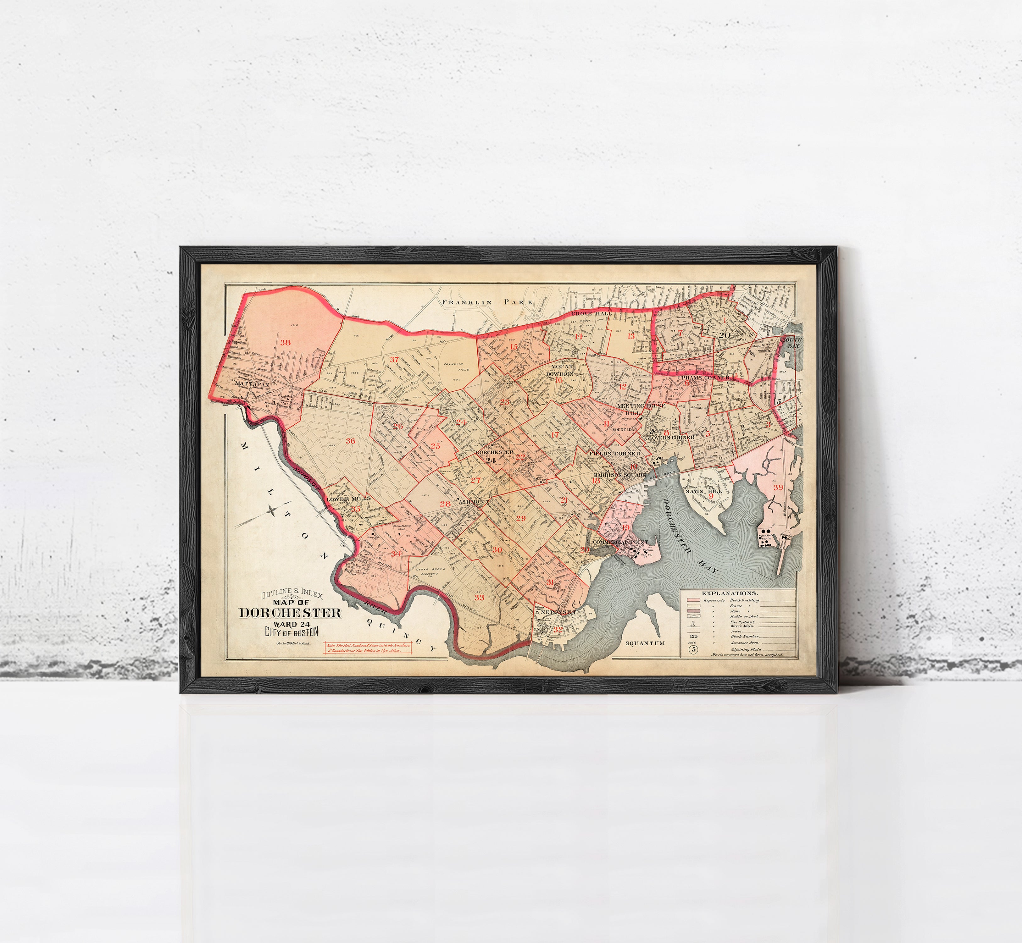The image is a framed vintage map of Dorchester, Massachusetts, showing the city's streets and surrounding areas.