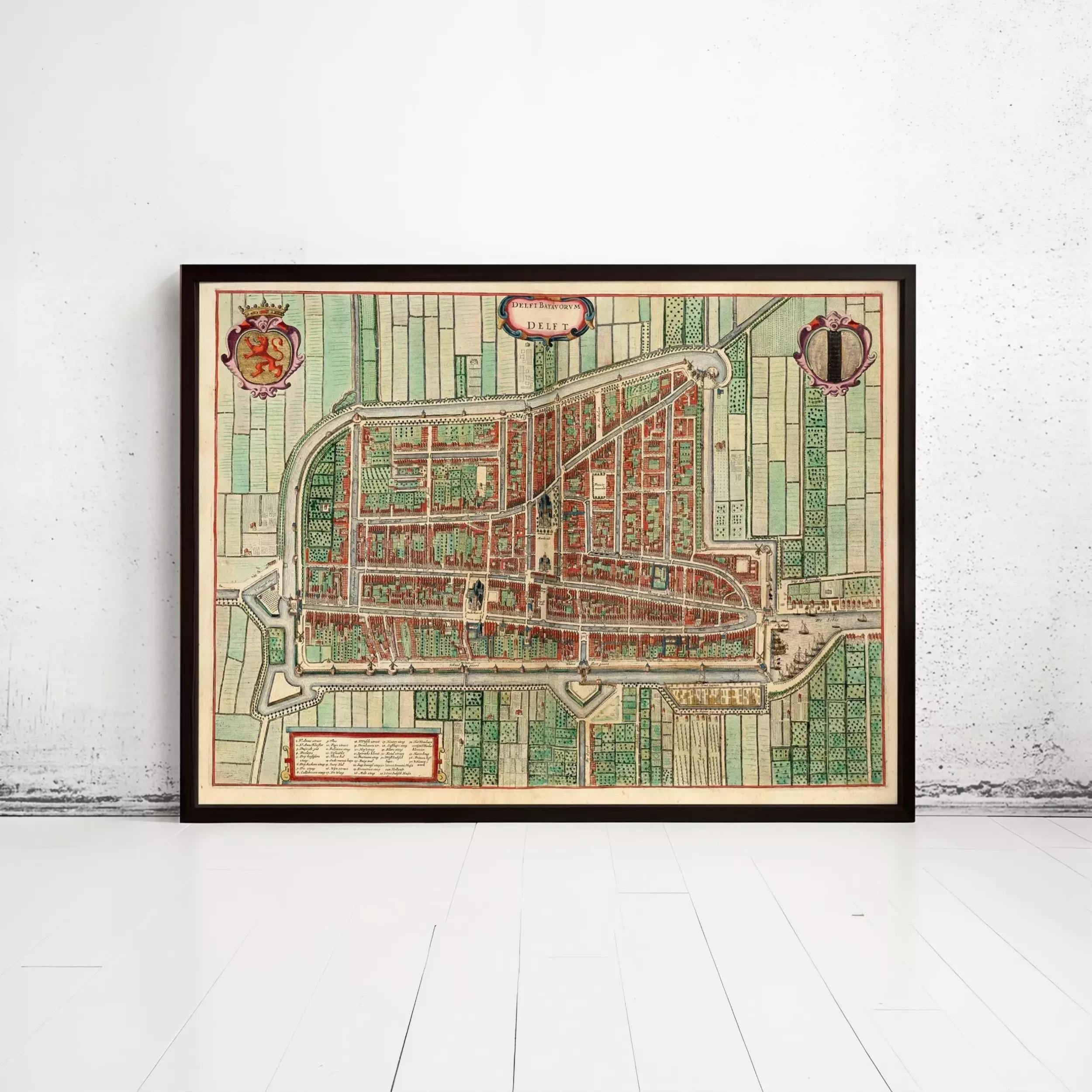 The image is a framed map of a city, depicting a detailed layout of streets, buildings, and other urban features.