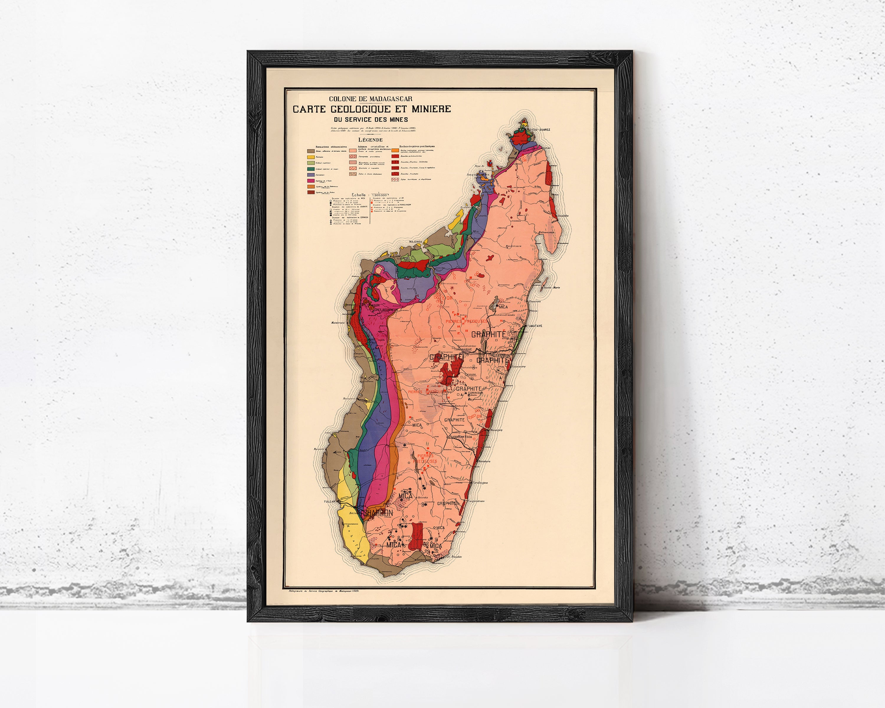 The image is a framed vintage map of Madagascar, depicting the country's geographical features and boundaries.