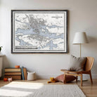 a large framed map of Stockholm, Sweden, hanging on a wall in a living room setting.