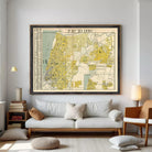 The image is a framed vintage map of a city, likely Jerusalem, with yellow and green coloring.