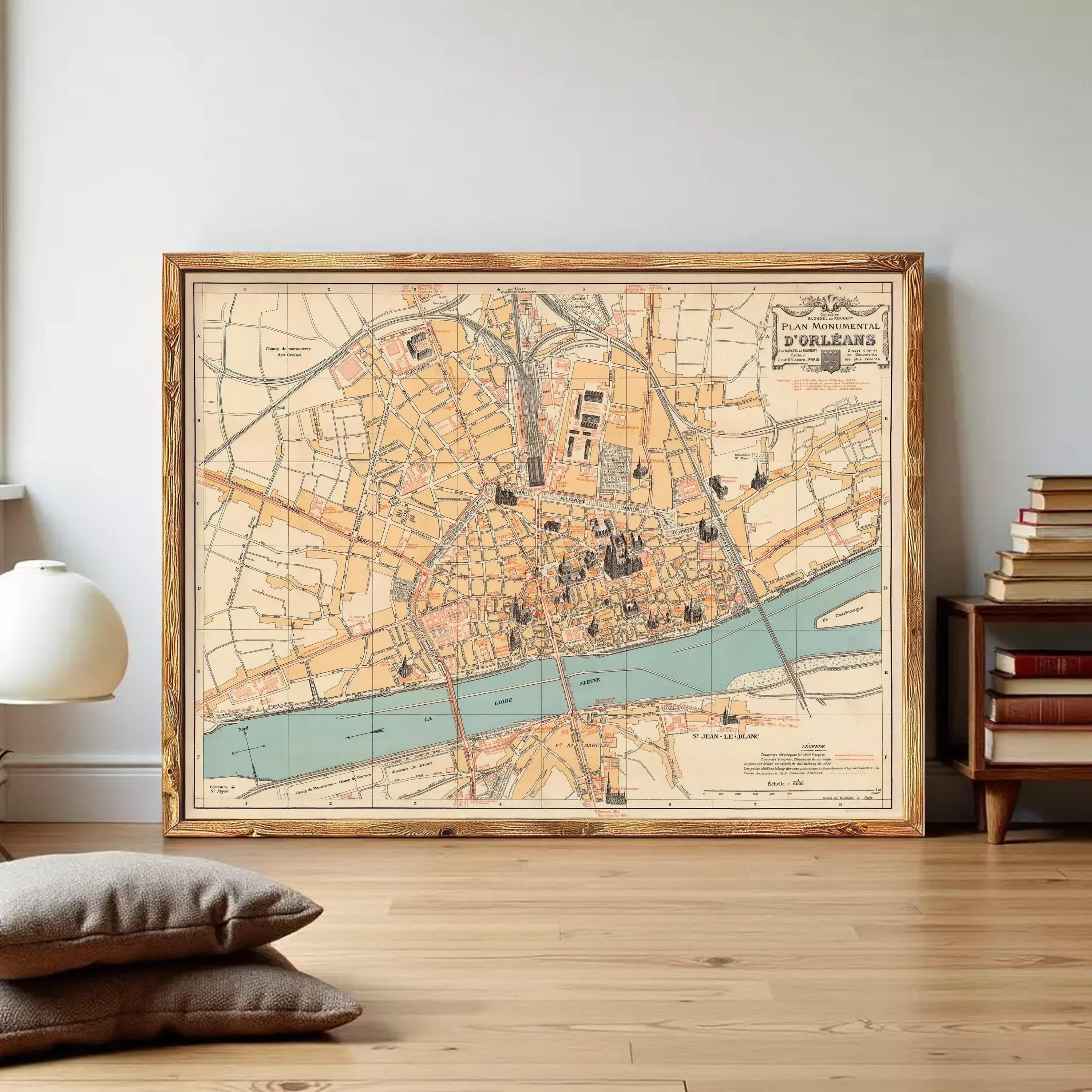 The image is a framed vintage map of a city, likely Paris, with various streets, landmarks, and a river depicted.