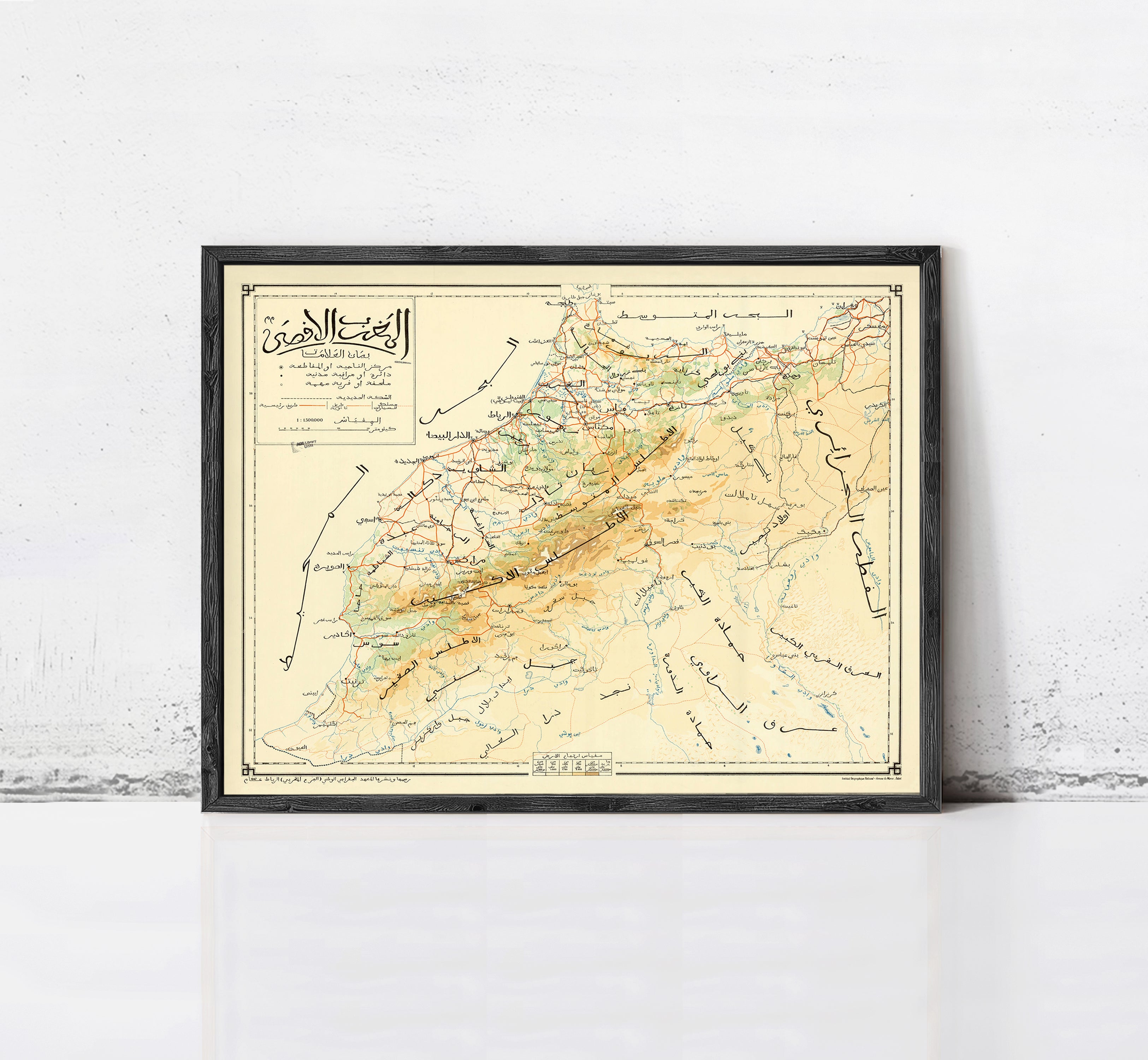 The image is a framed vintage map of a region, likely depicting a mountainous area, with various roads and landmarks marked on it.