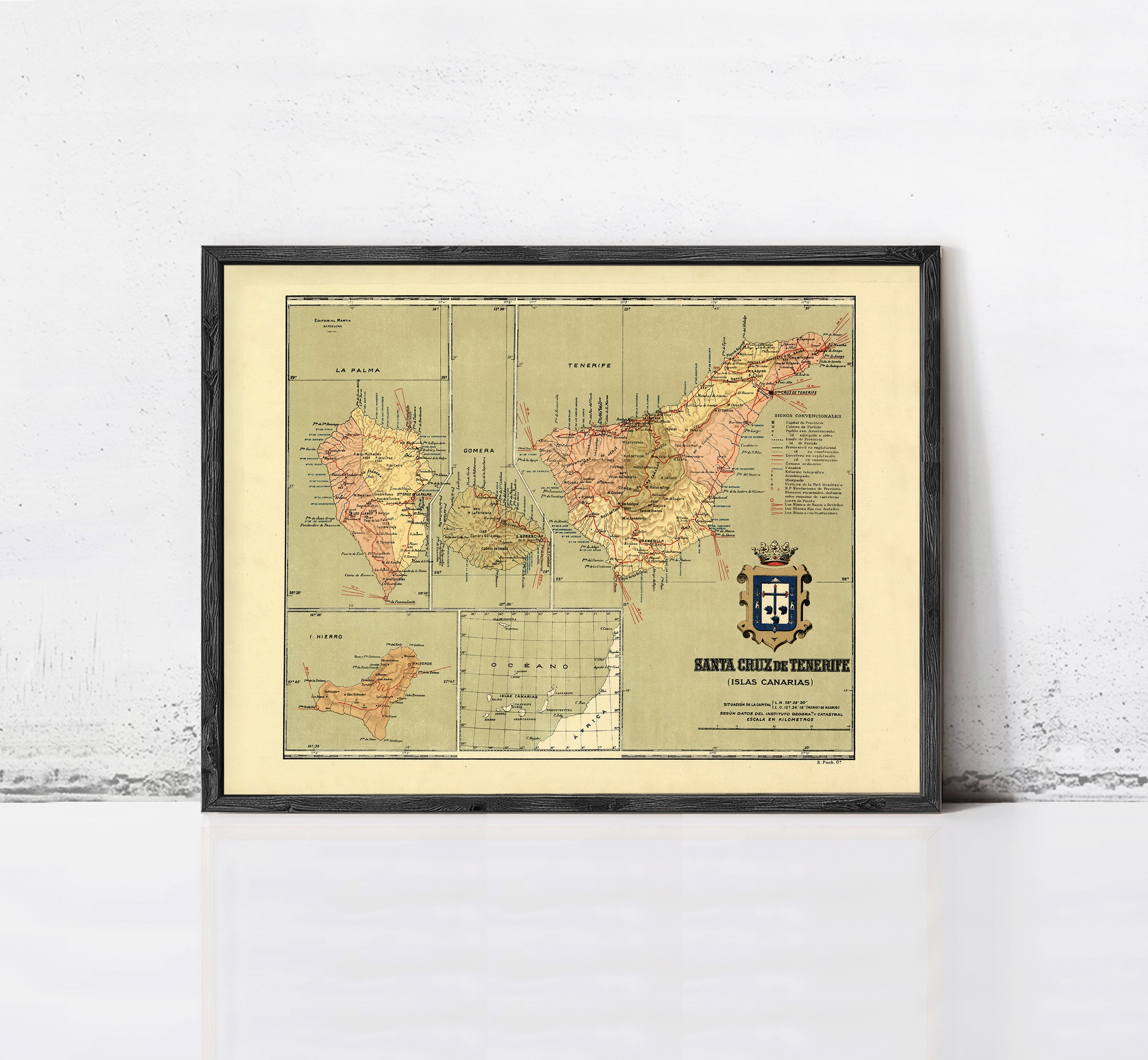 The image is a framed vintage map of the Iberian Peninsula, showing the various regions and islands within the region.
