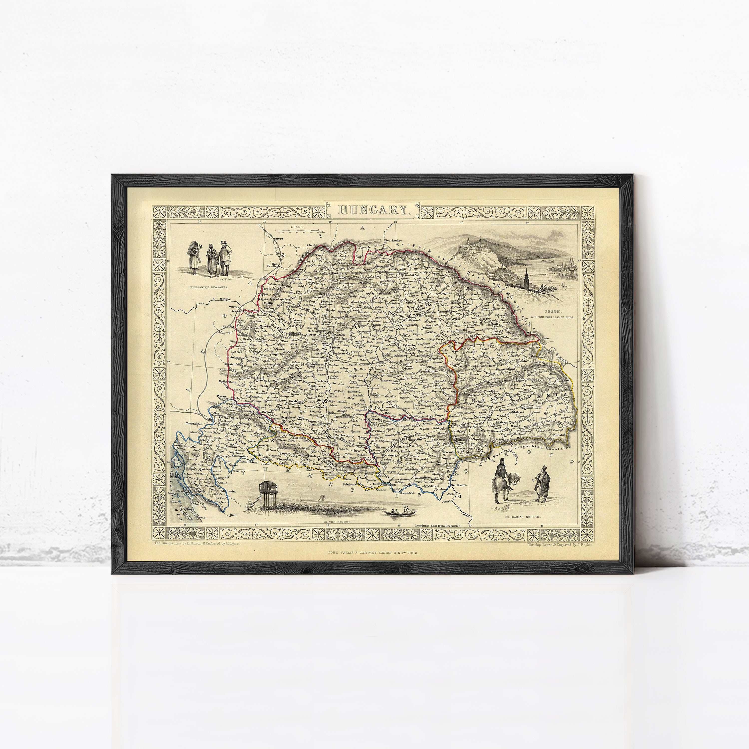 The image is a framed vintage map of Hungary, depicting various landmarks and regions within the country.