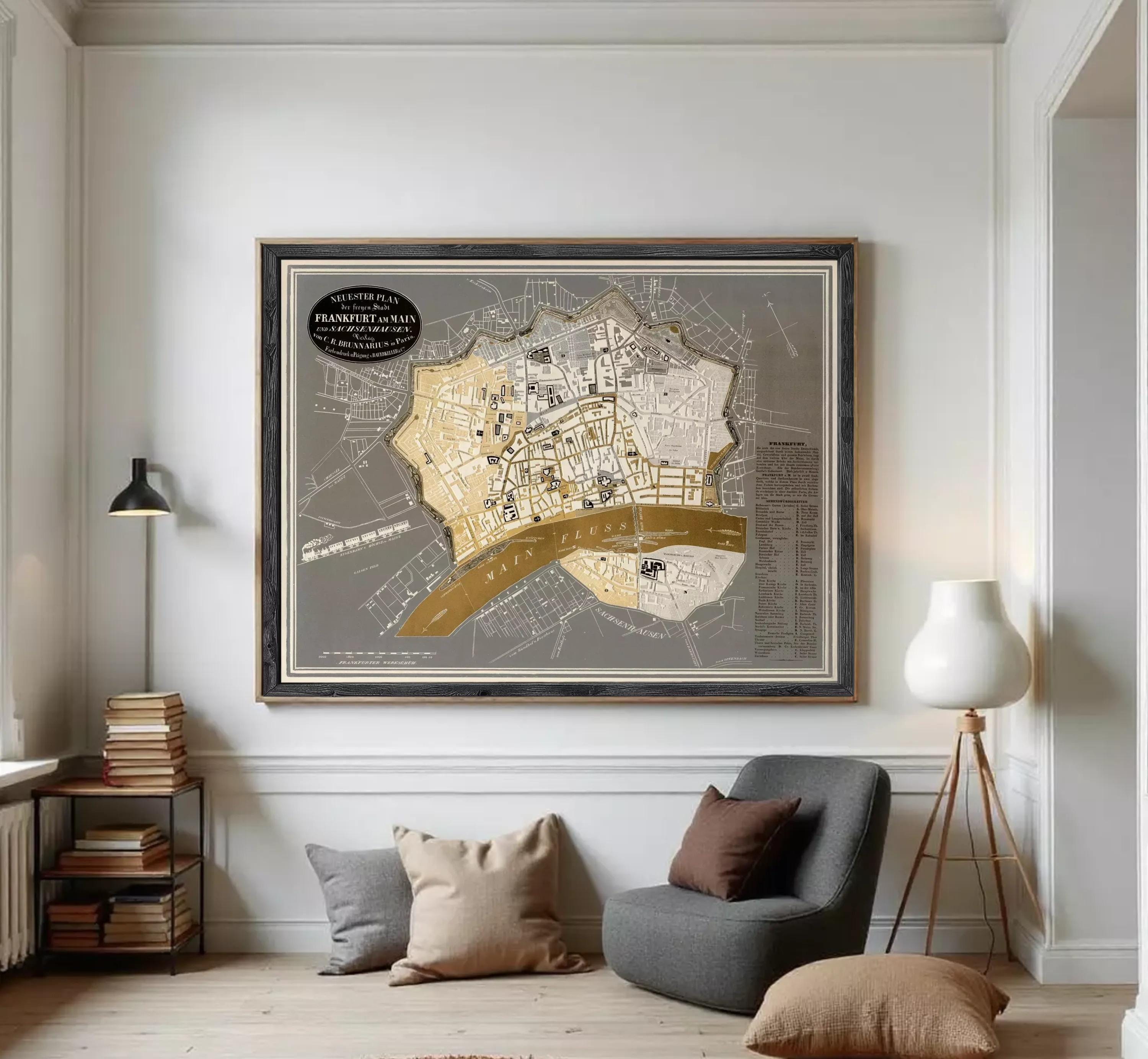 The image is a framed map of a city, likely a vintage or historical map, displayed on a wall.