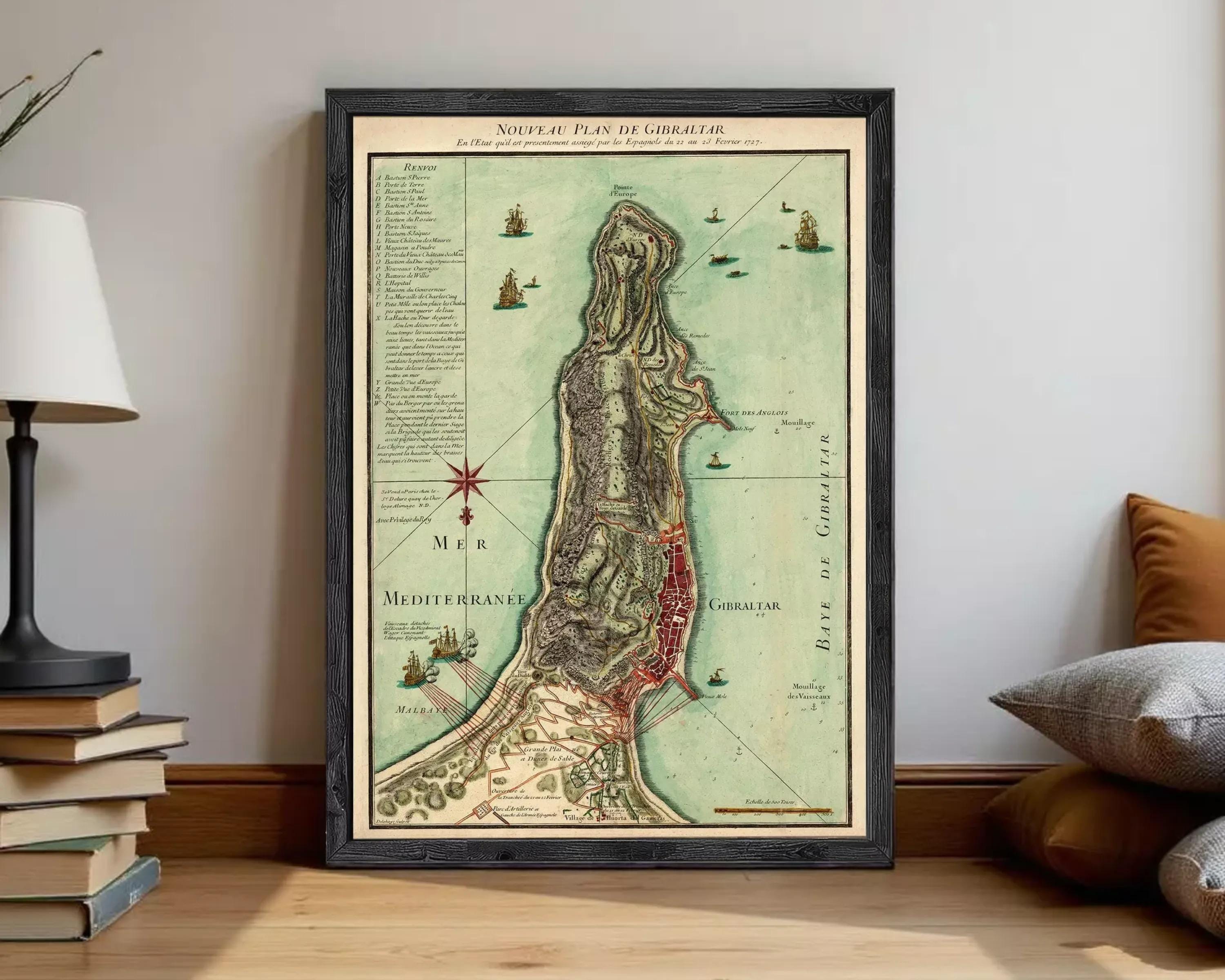The image is a framed map of the island of Gibraltar, showing the surrounding areas and the coastline.