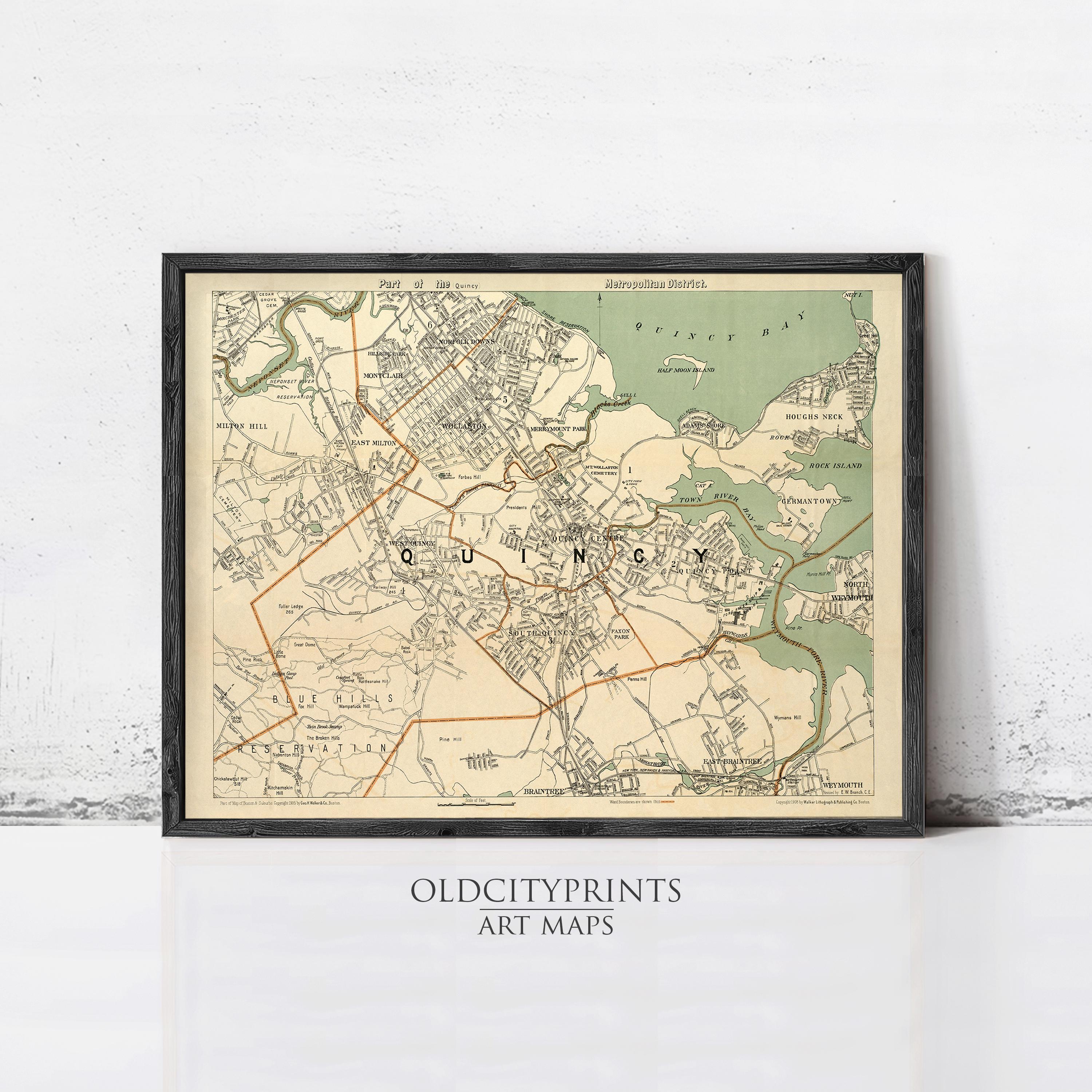 The image is a framed vintage map of the city of QuINCY, with various streets and landmarks labeled.