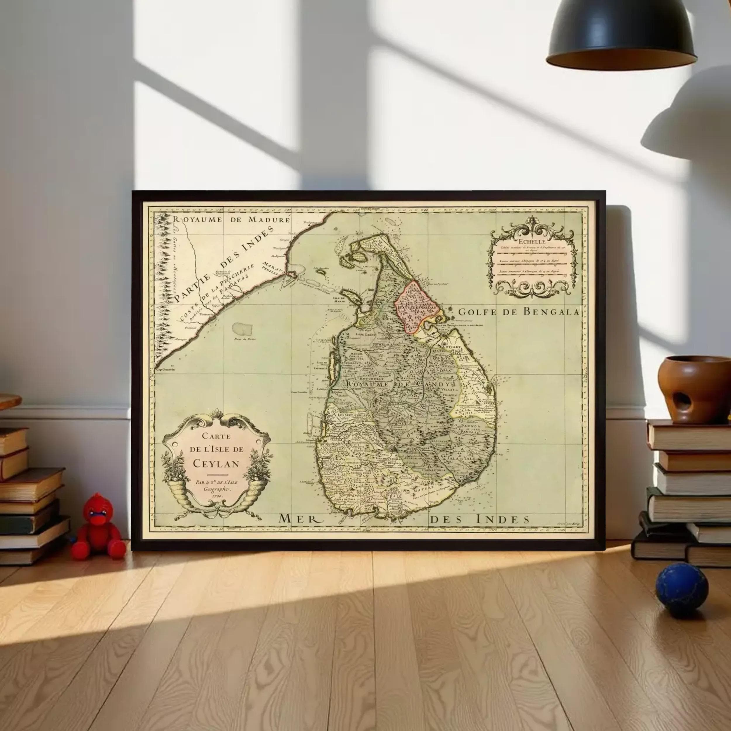 The image is a framed vintage map of Sri Lanka, showing the country's geographical layout and boundaries.