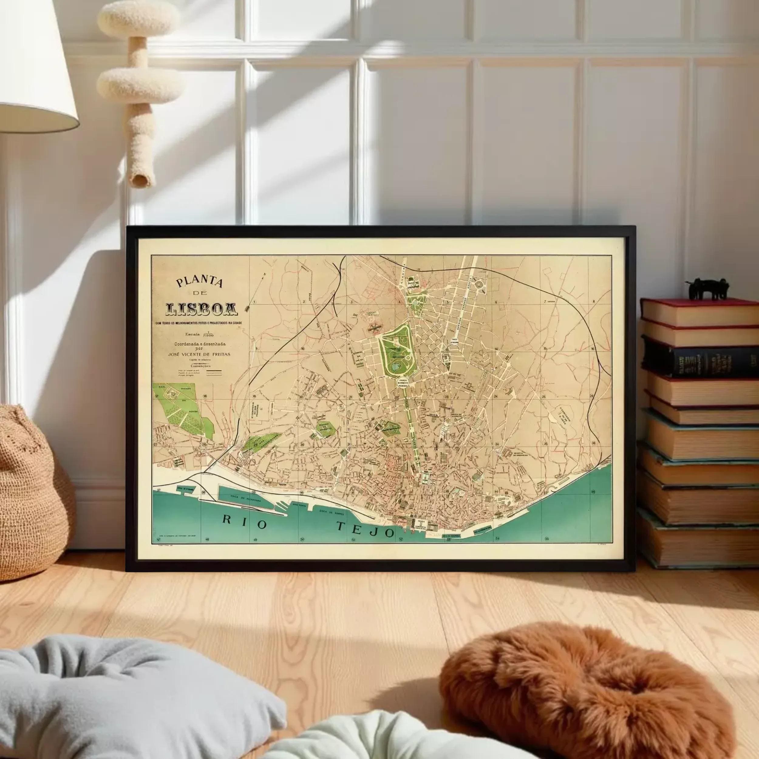 The image is a framed vintage map of Lisbon, Portugal, depicting the city's streets, landmarks, and surrounding areas.