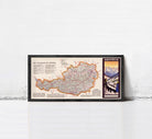 The image is a framed map of Austria, with a mountain landscape visible in the corner.