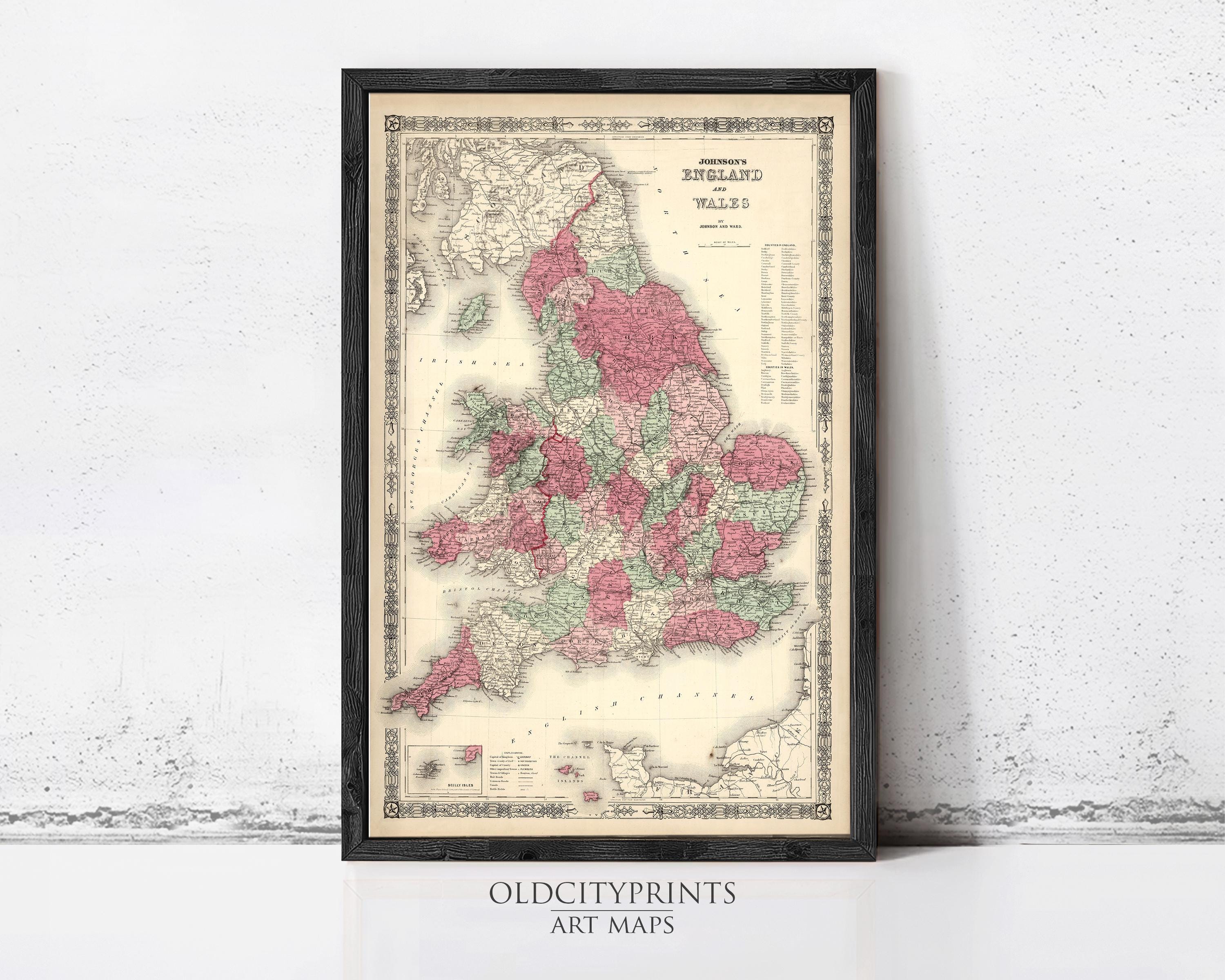 The image is a framed vintage map of the United Kingdom, specifically England and Wales, with a black border and a sepia-toned color scheme.