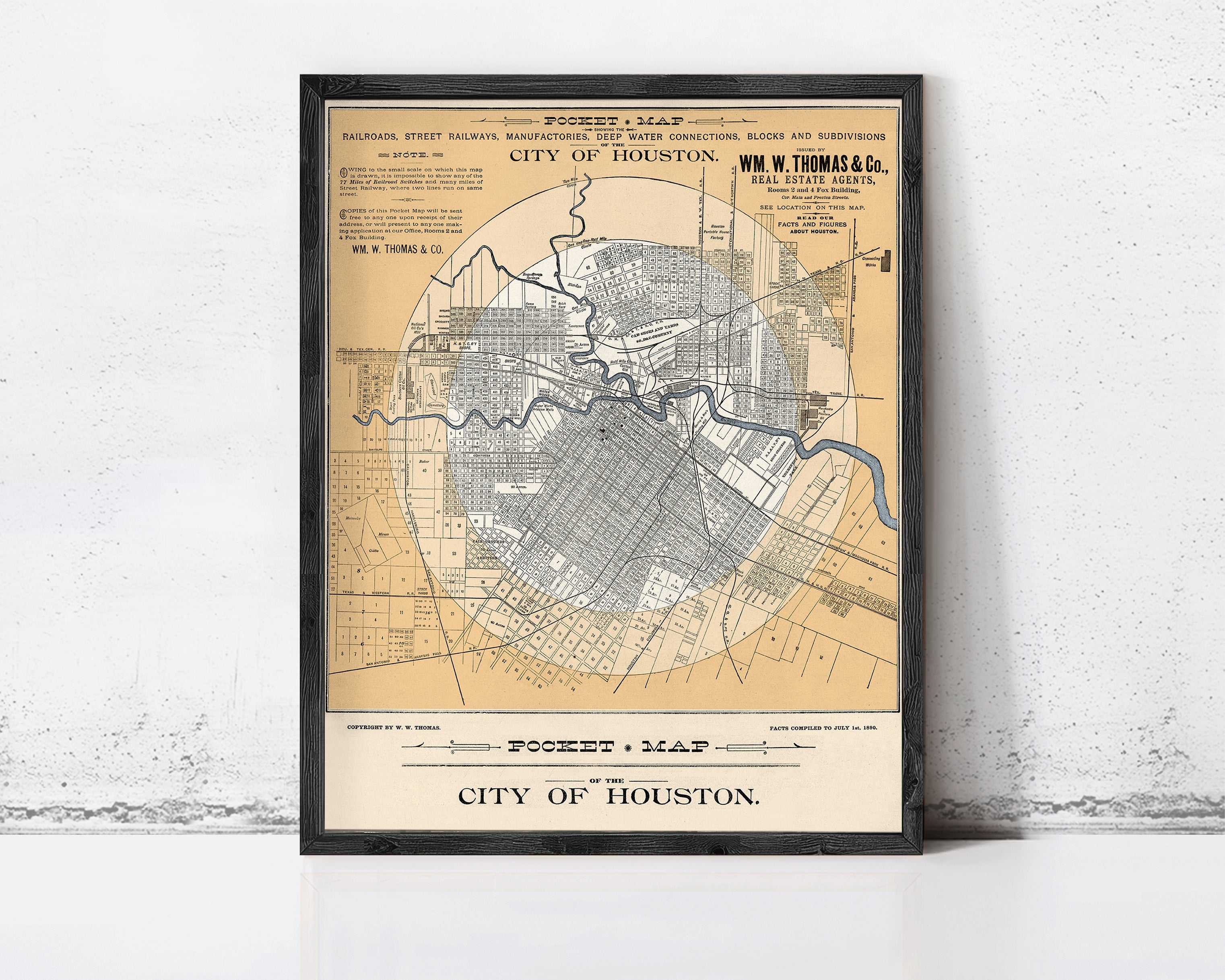 The image is a framed vintage map of the city of Houston, Texas, depicting the layout of the city and surrounding areas.
