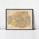 The image is a framed vintage map of Paris, France, depicting the city's streets and landmarks.