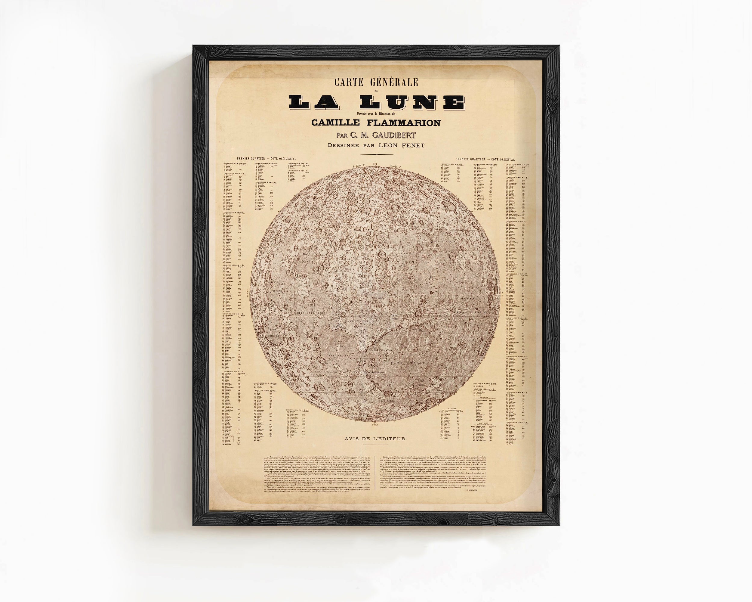 The image is a framed vintage poster depicting a detailed map of the moon, with various labels and descriptions surrounding the central image.
