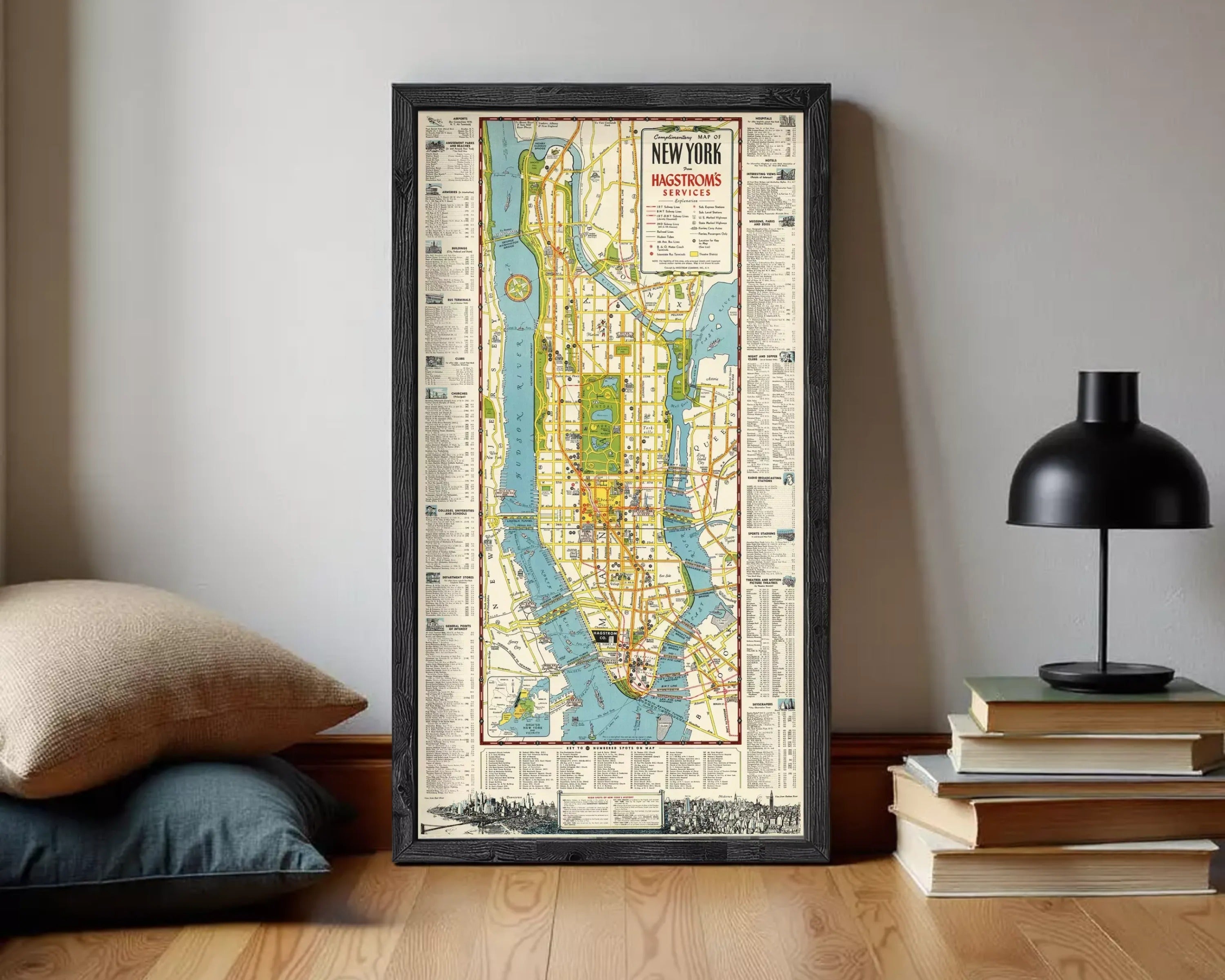 The image is a framed vintage map of New York City, depicting the city's streets, landmarks, and waterways.