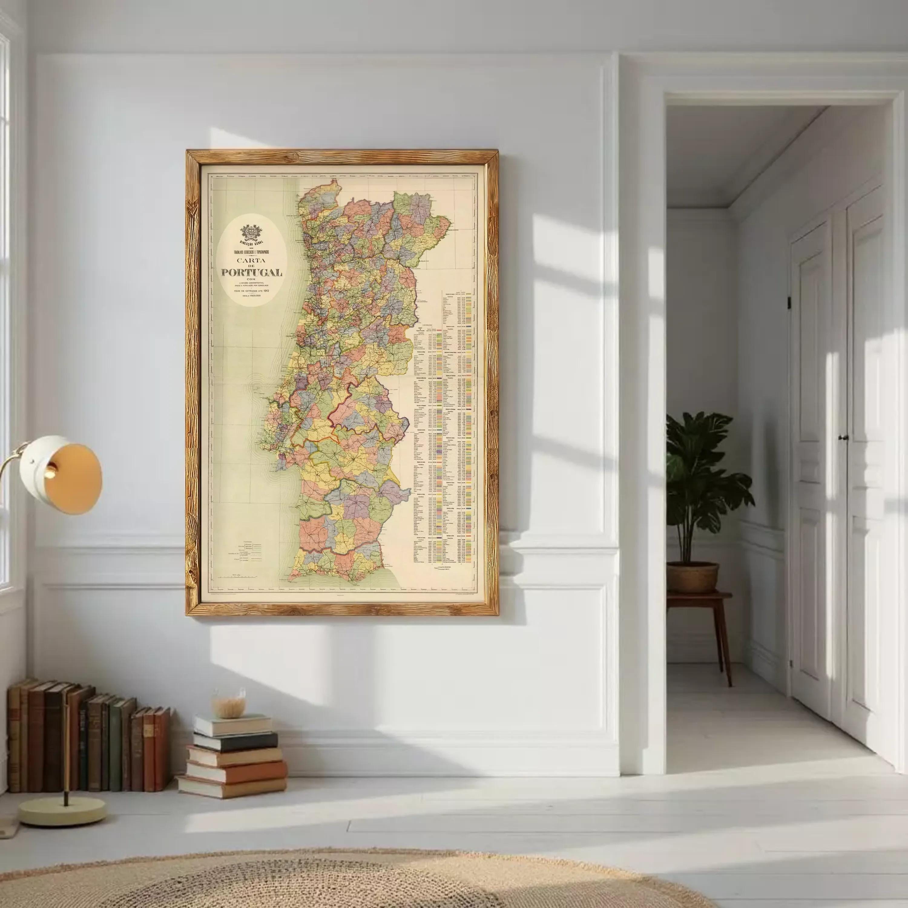 a large framed map of Portugal hanging on a white wall.